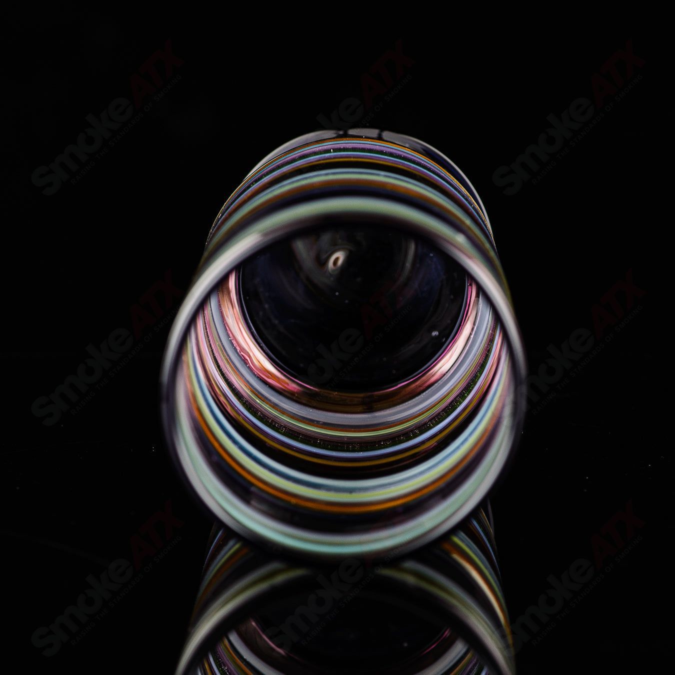 Encalmo Pint Glass by Freeek Glass, a clear heady glass cup with a smooth, artistic design perfect for enjoying beverages.