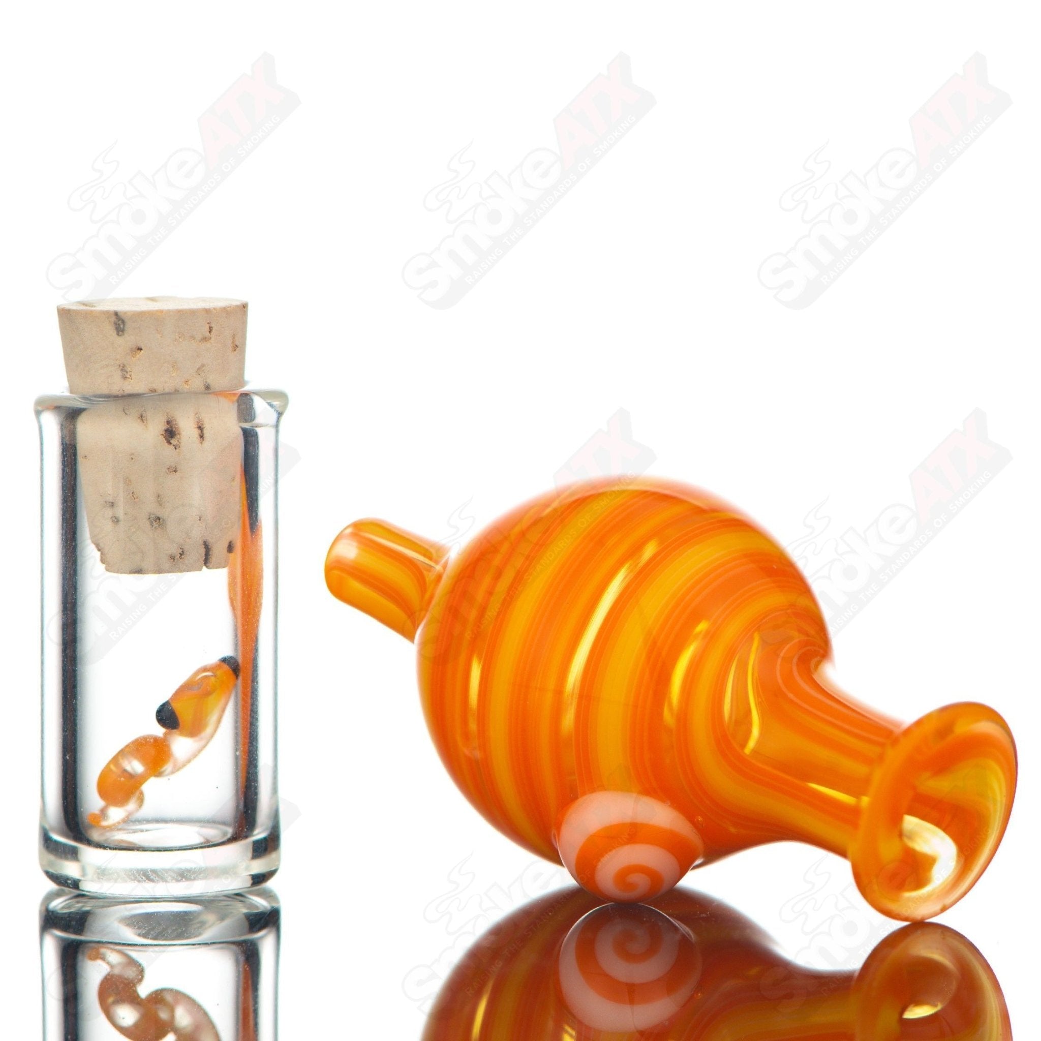 Encalmo Snake Rig Set by Niko Cray, a heady glass concentrate rig with intricate snake design and colorful glasswork.