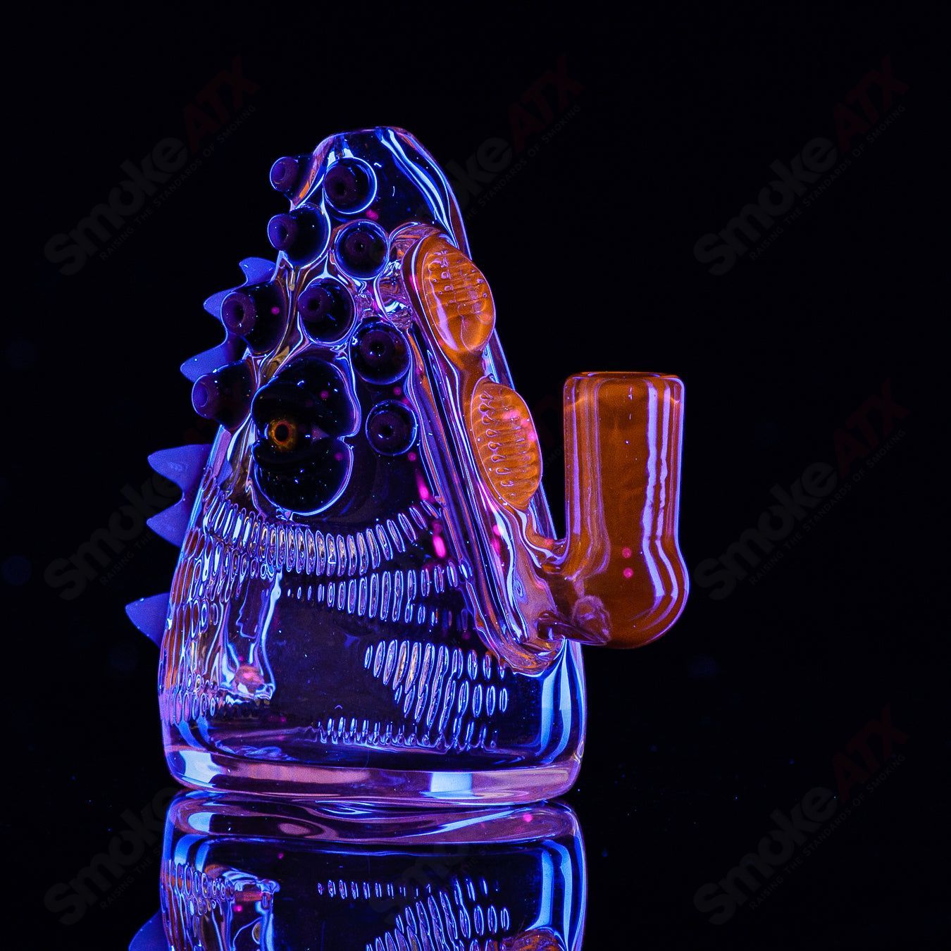 Heady glass Eyepod #113 concentrate rig by Salt Glass in Neutronium and Gunmount Black with intricate design and sturdy build.