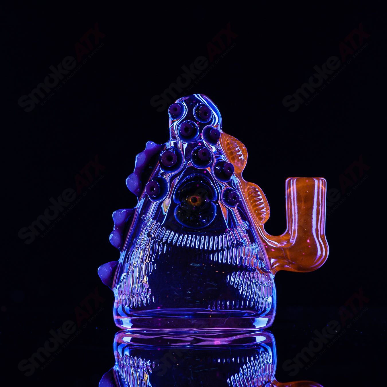 Salt Glass Eyepod #113 concentrate rig in black Neutronium and Gunmount design, featuring a sleek heady glass finish.