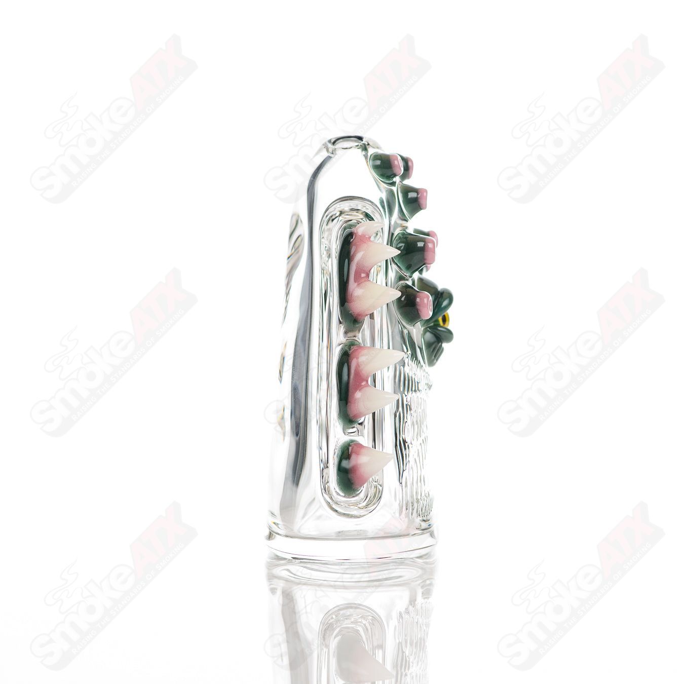 Salt Glass Eyepod #113 concentrate rig with Neutronium and Gunmount black design, featuring a sleek, artistic heady glass appearance.