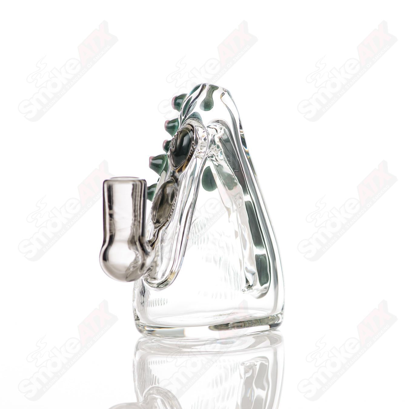 Salt Glass Eyepod #113 concentrate rig in black Neutronium and Gunmount design, featuring a sleek heady glass appearance.