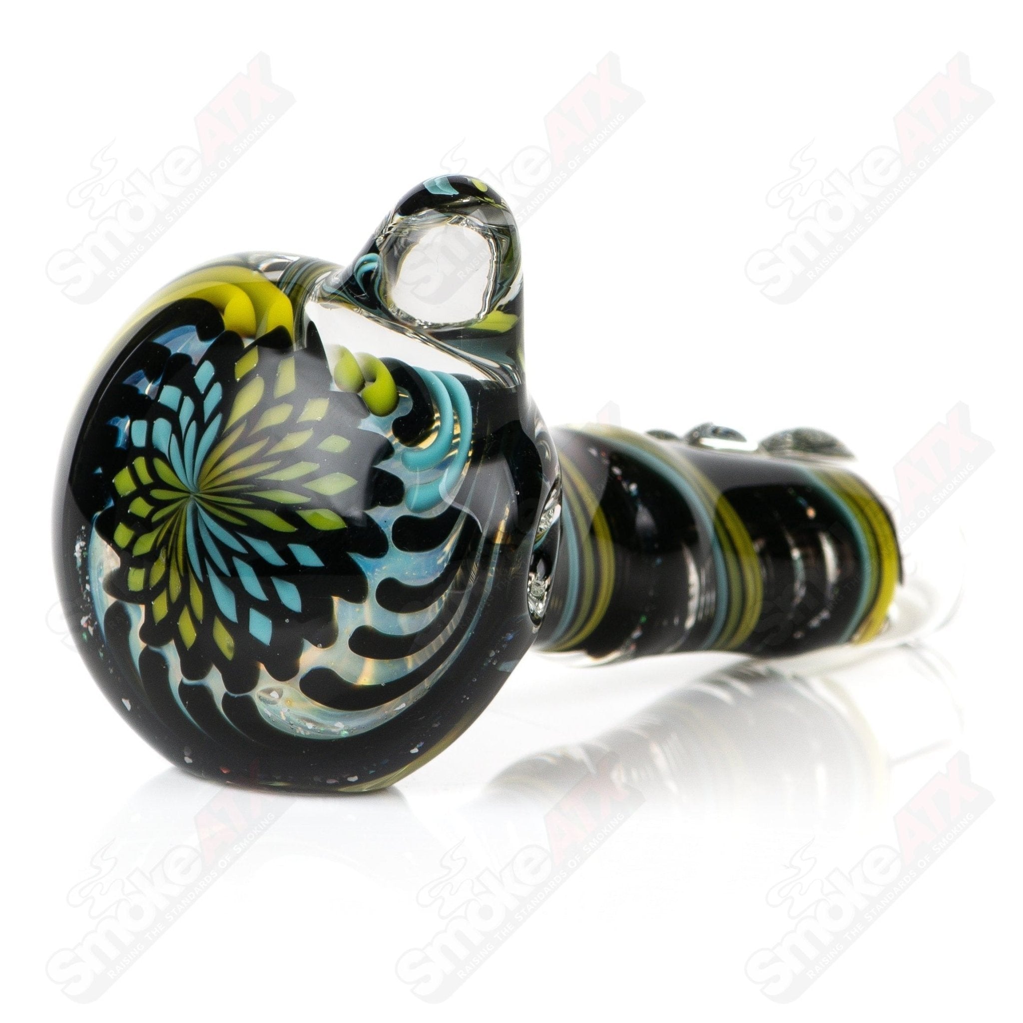 Glass Filla Twist Spoon pipe by Rotational Science, featuring a clear design with a twist detail for smooth smoking sessions.