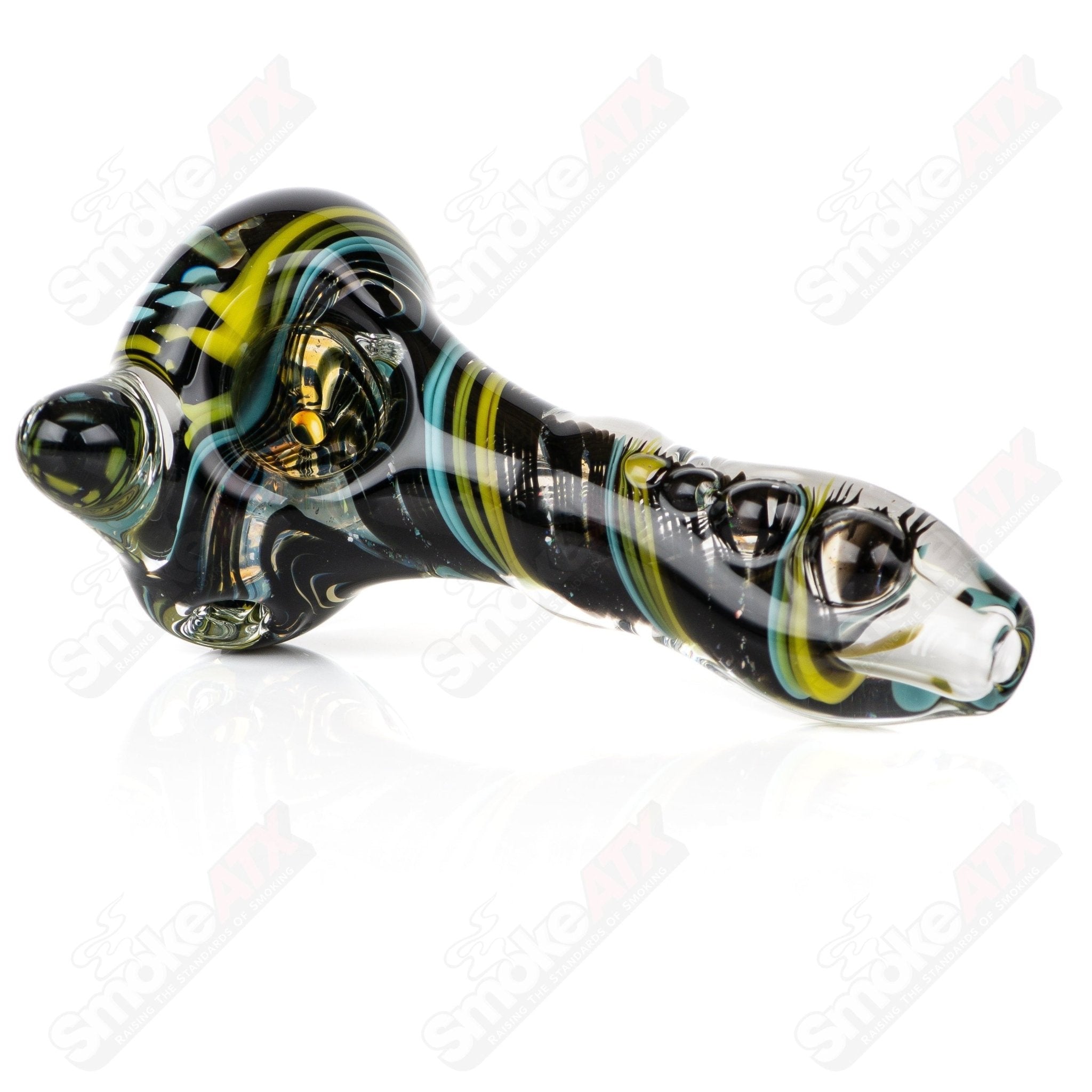 Glass Filla Twist Spoon pipe by Rotational Science, showcasing a clear, twisted design with a smooth bowl and mouthpiece.