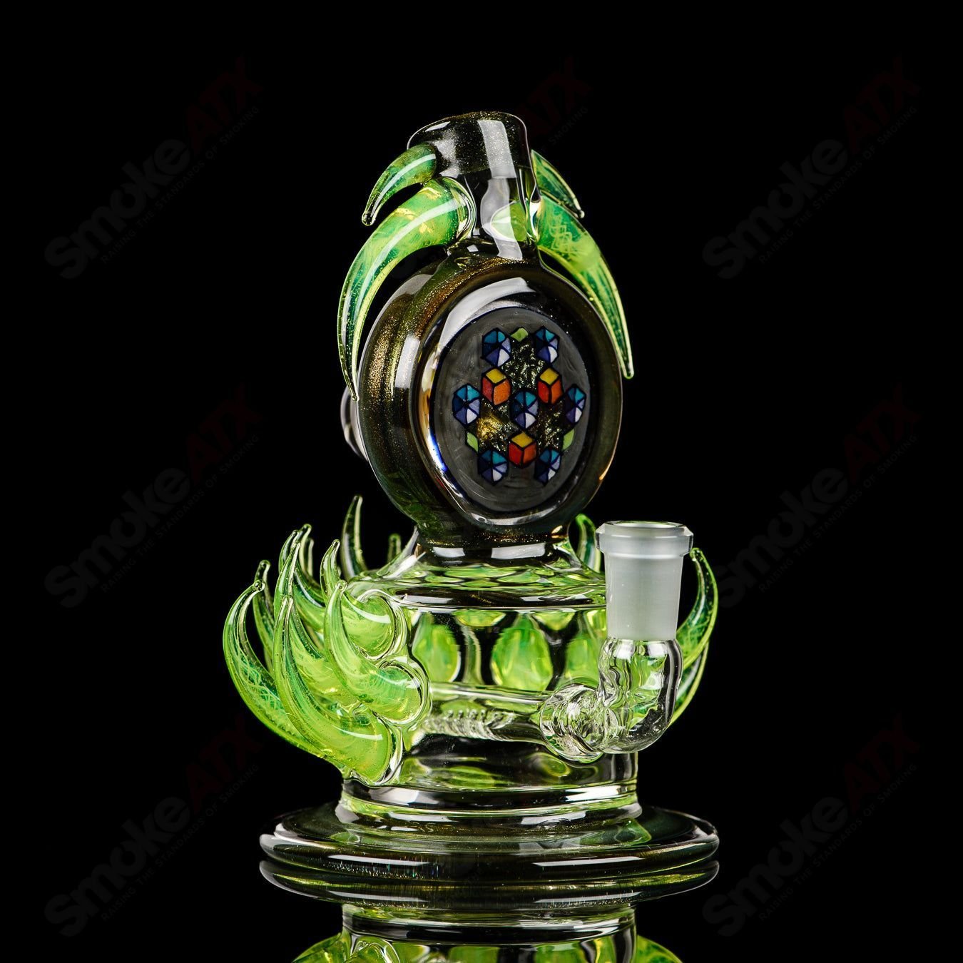 Fillacello DiscRig by Freeek Glass, a colorful heady glass concentrate rig with Slyme design and intricate glasswork.