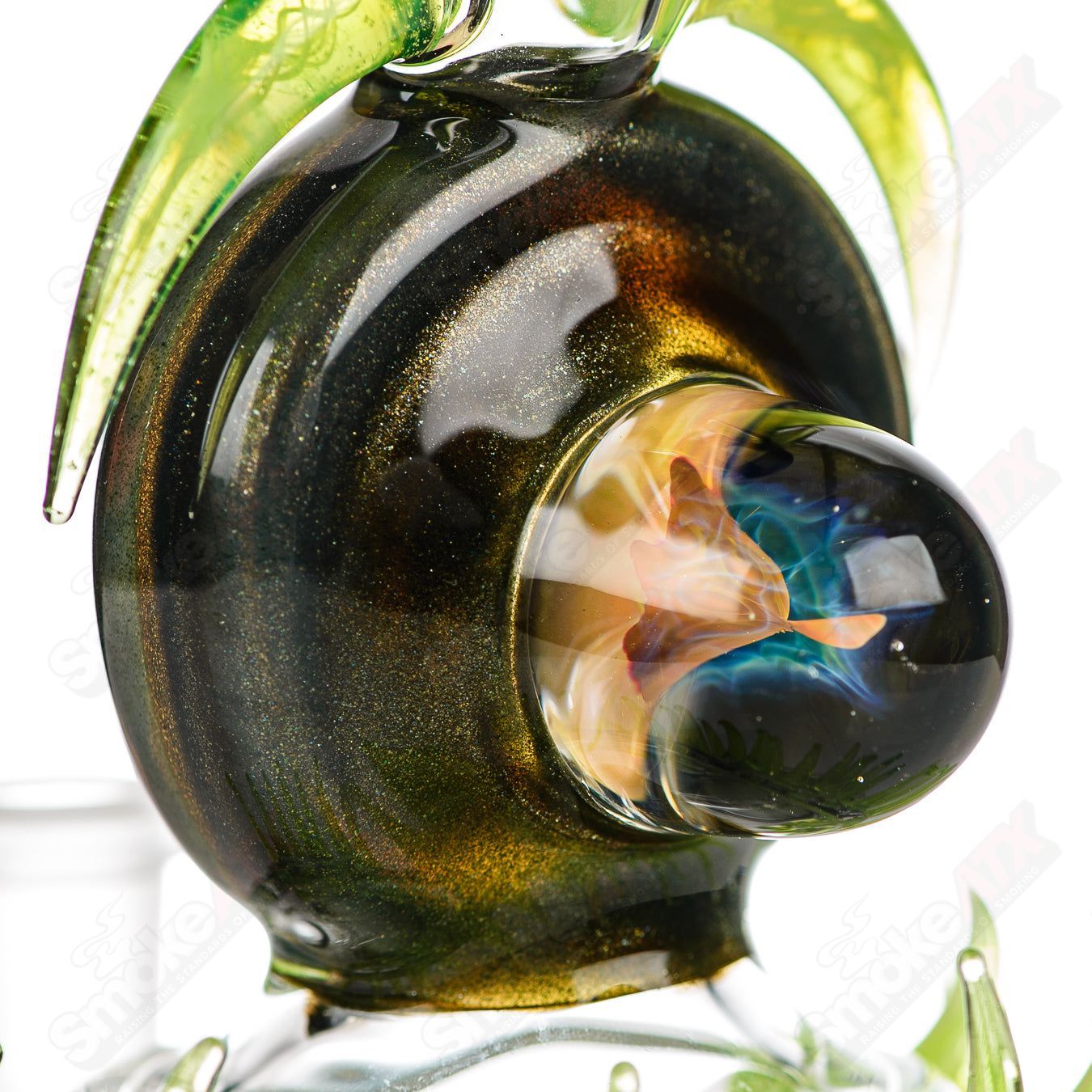 Fillacello DiscRig by Freeek Glass, a colorful heady glass concentrate rig with a unique disc design and Slyme pattern.