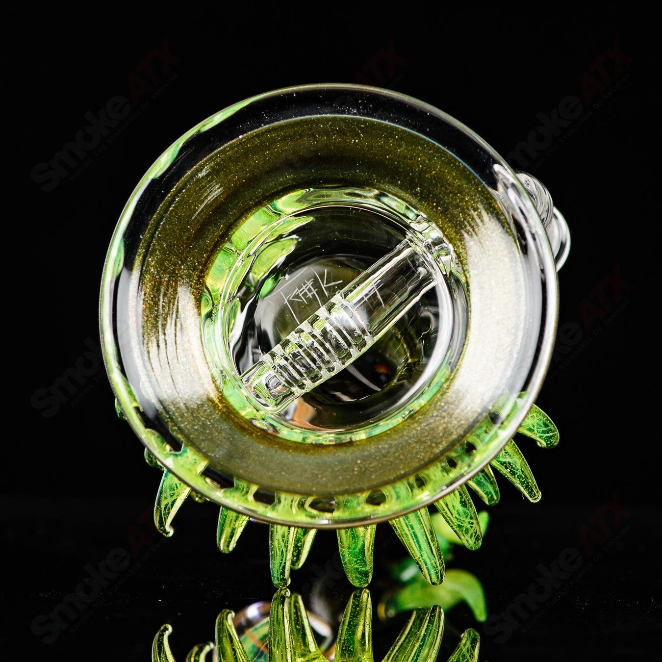 Fillacello DiscRig by Freeek Glass, a colorful heady glass concentrate rig with artistic Slyme design and intricate glasswork.