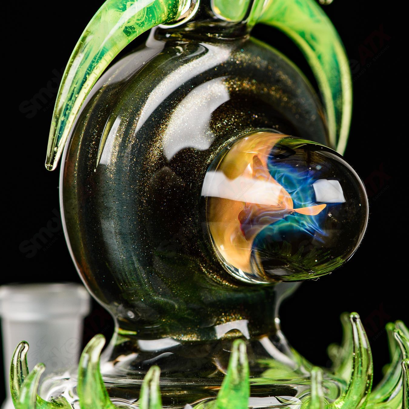 Fillacello DiscRig by Freeek Glass, a colorful heady glass concentrate rig with intricate design and vibrant Slyme coloration.