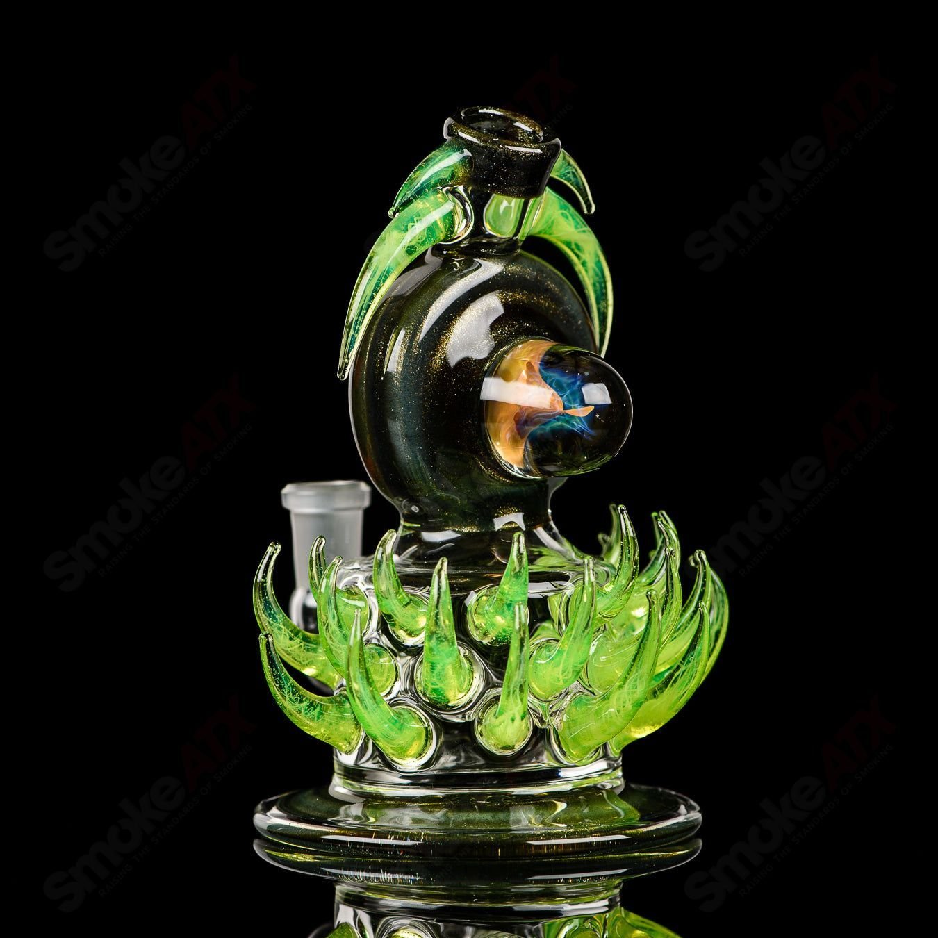 Fillacello DiscRig by Freeek Glass, a vibrant heady glass concentrate rig with colorful Slyme design and intricate glasswork.