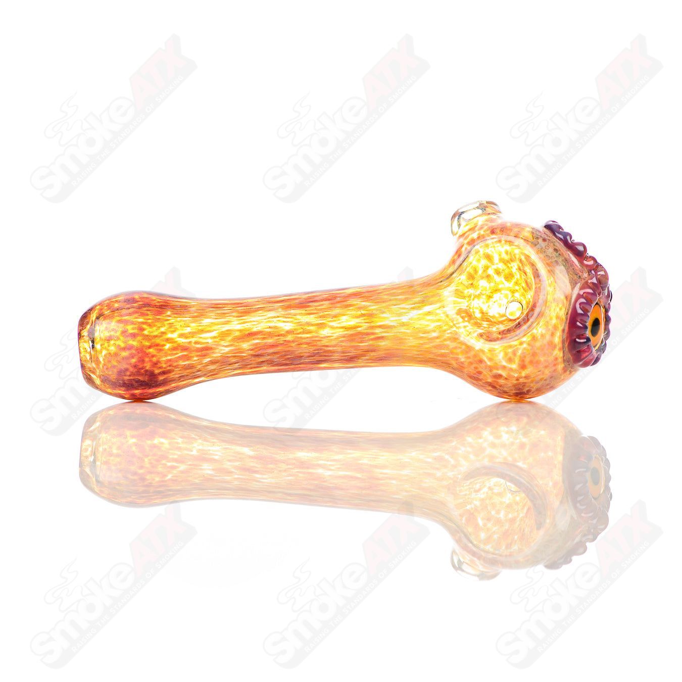 Fumed spotted owl glass pipe by Four Winds Flameworks featuring a detailed owl design in vibrant colors.