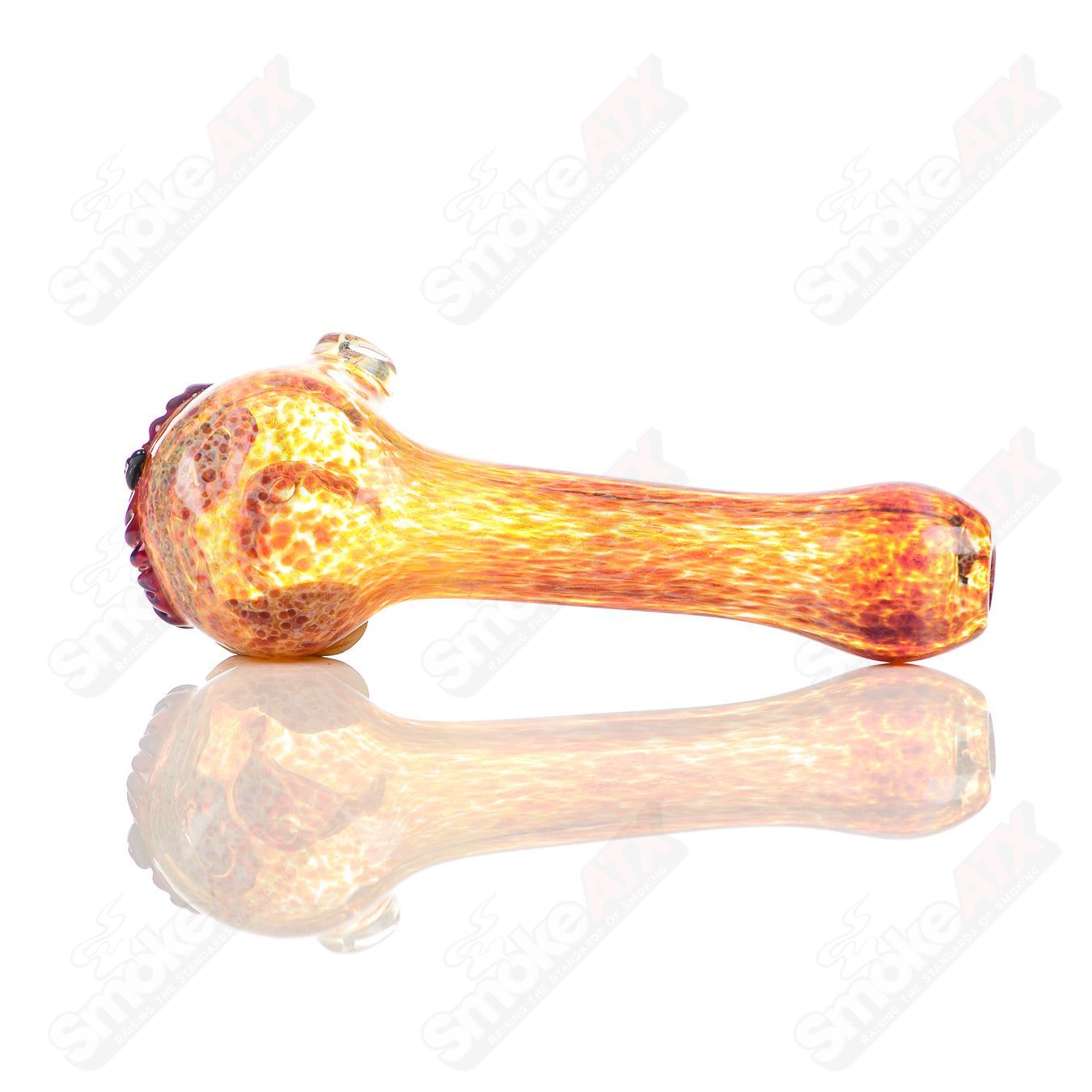 Fumed spotted owl glass spoon pipe by Four Winds Flameworks, featuring detailed owl design and fumed glass accents.