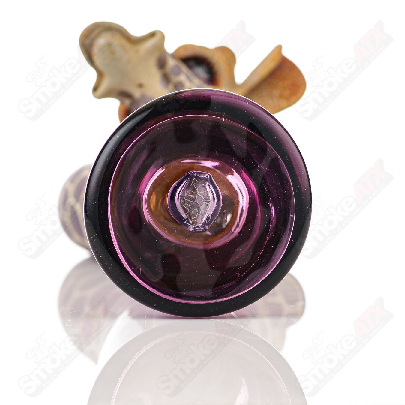 Robertson Glass Giraffe Bent Neck Bottle Rig for concentrates in Purple Rain and Royal Jelly colors, featuring a detailed giraffe design.