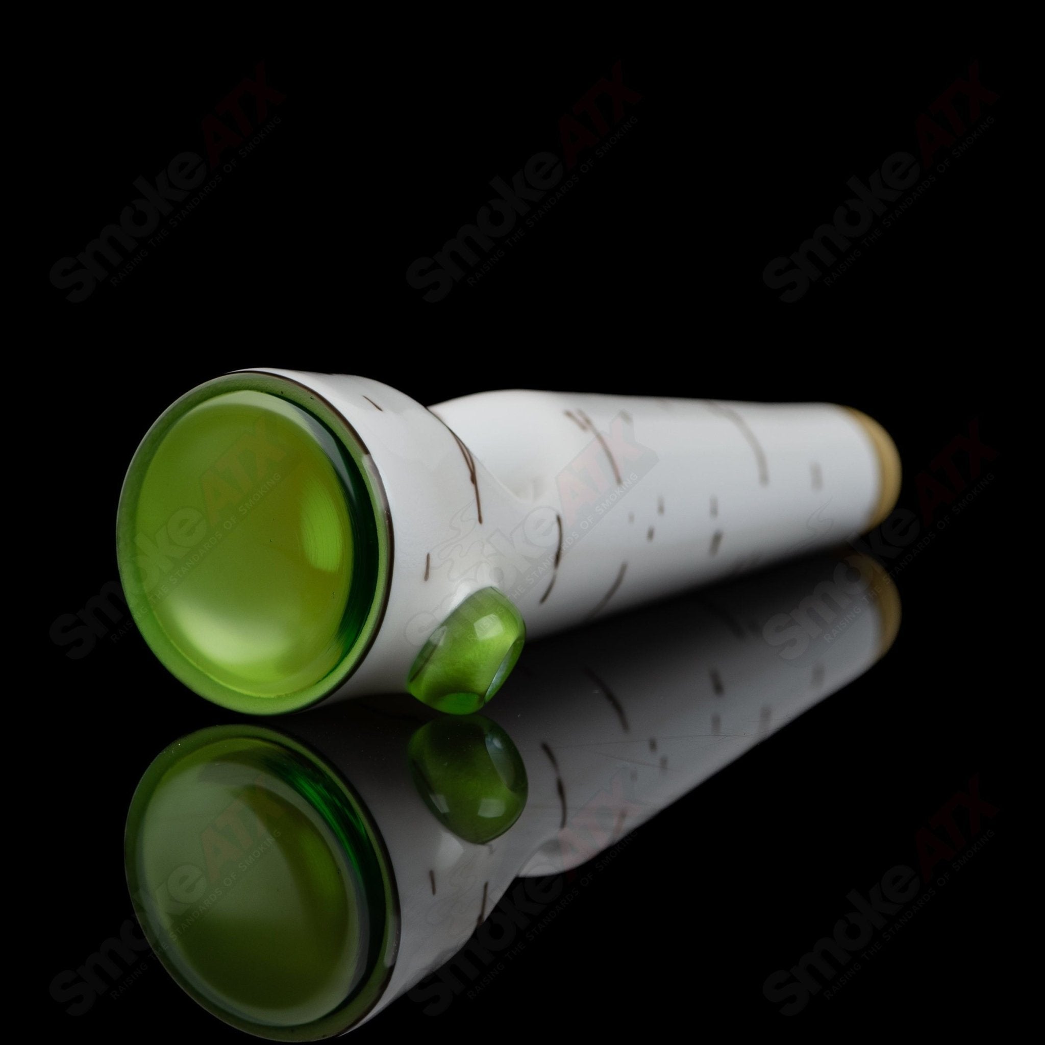 Green Birch Spoon Foster Glass hand pipe by Foster Glass, featuring a vibrant green design and intricate heady glass craftsmanship.