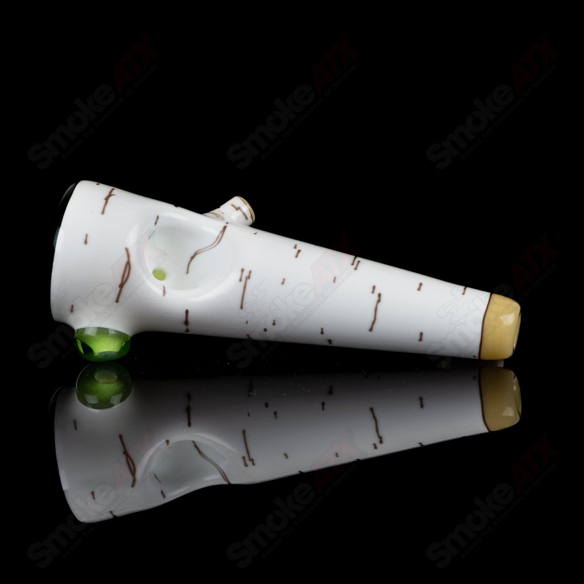 Green Birch Spoon Foster Glass hand pipe by Foster Glass, featuring a vibrant green birch design and intricate glass craftsmanship.