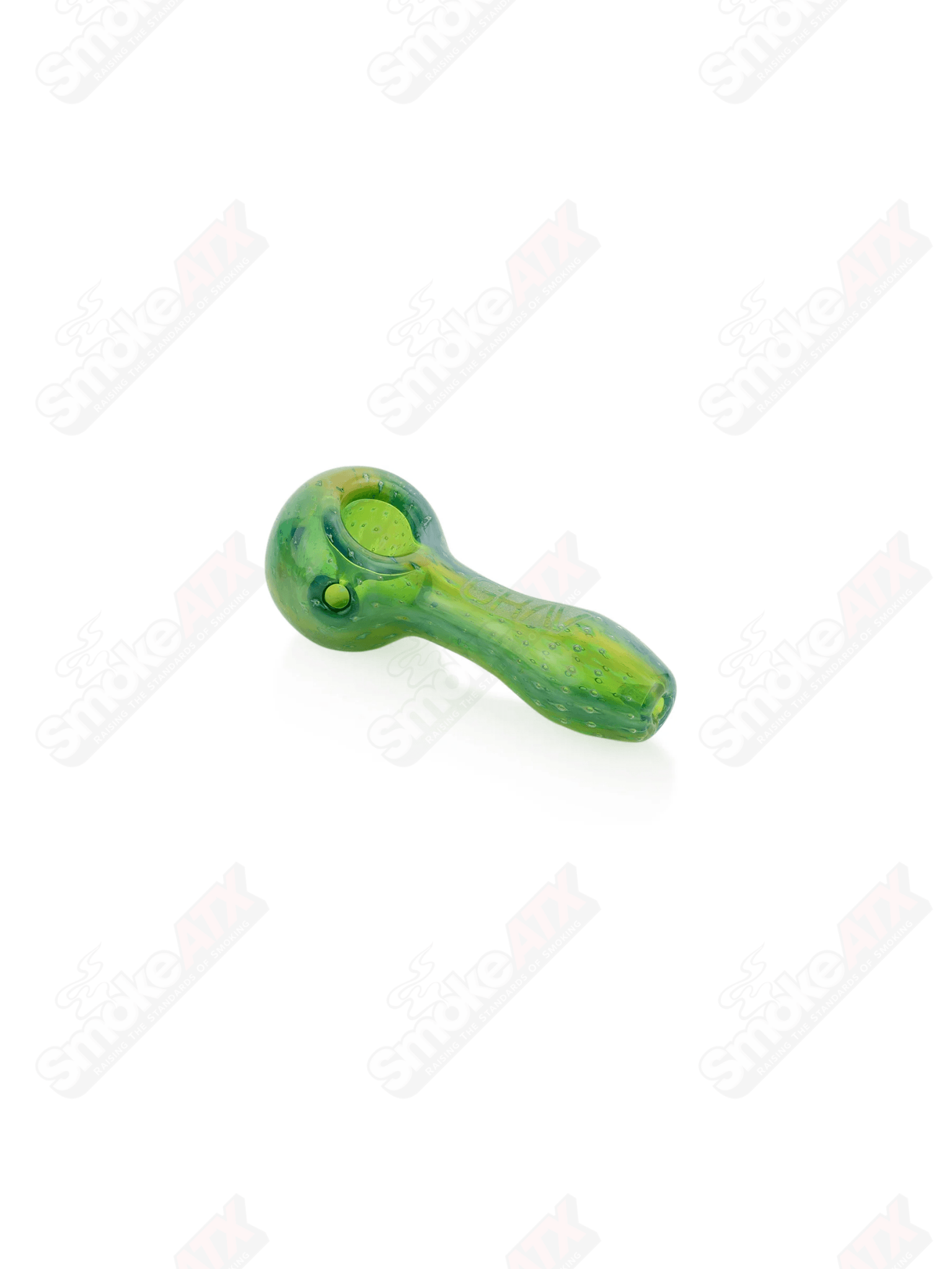 Green Bubble Trap Spoon pipe by Grav, clear glass with green bubble accents, featuring a compact and functional design.