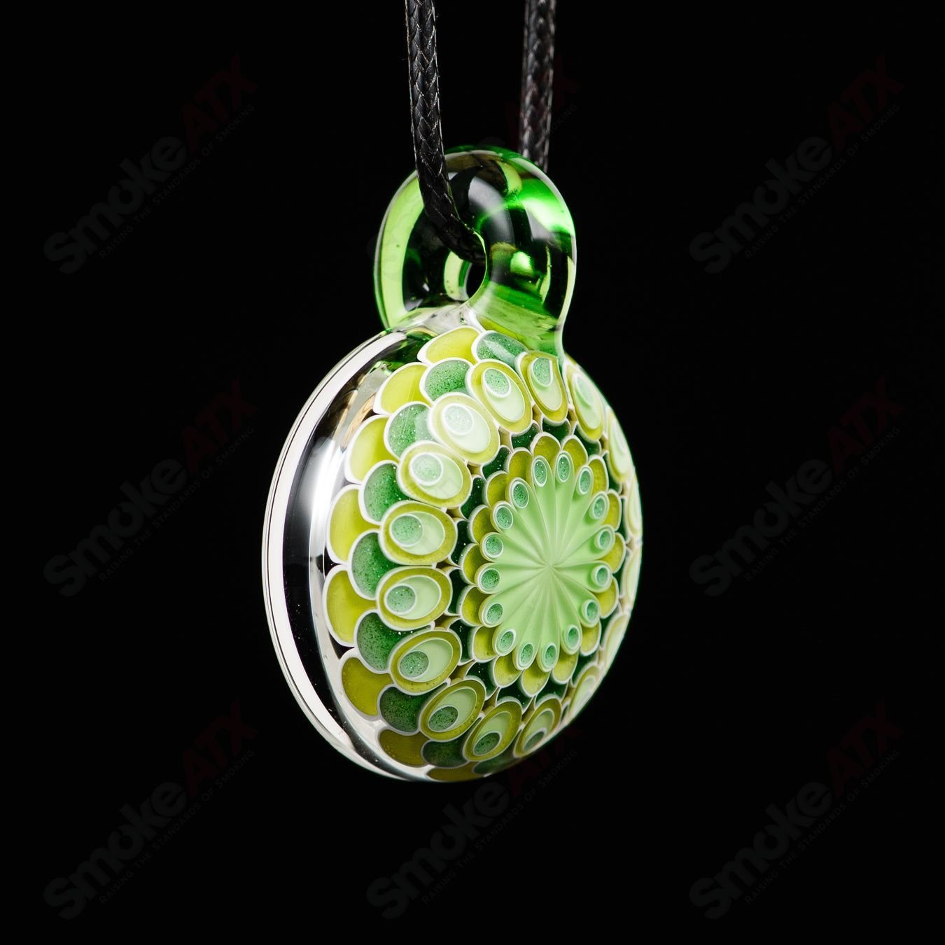 Green No Opal Dot Stack Pendant by Olour, a glass jewelry pendant featuring a layered design with blue and green hues.