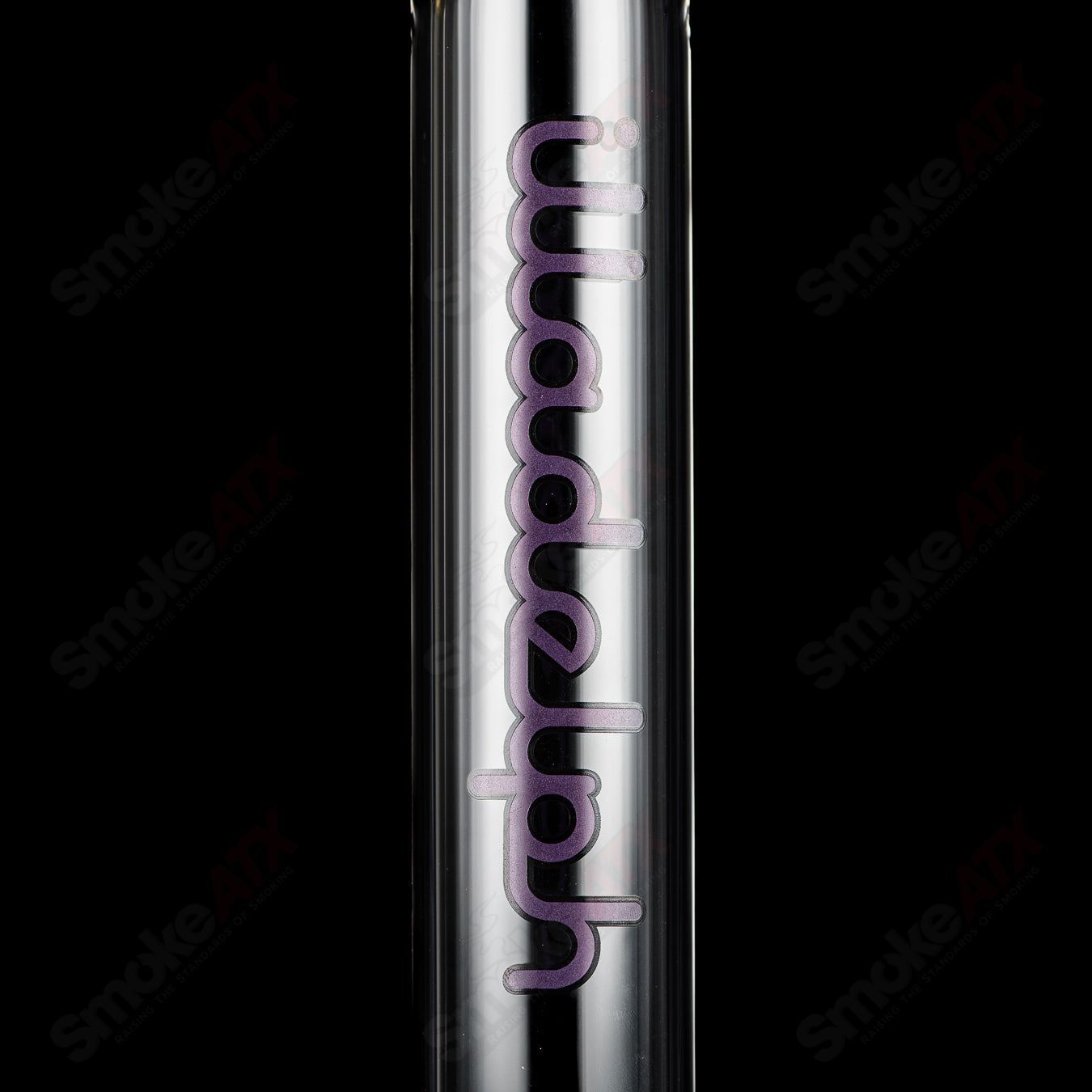 Illadelph Purple and Aqua Jordan Beaker, a colorful heady glass beaker with vibrant purple and aqua accents.