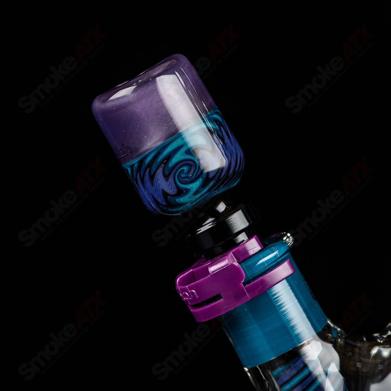 Illadelph Purple and Aqua Jordan Beaker, a colorful heady glass piece with vibrant purple and aqua accents and a beaker shape.