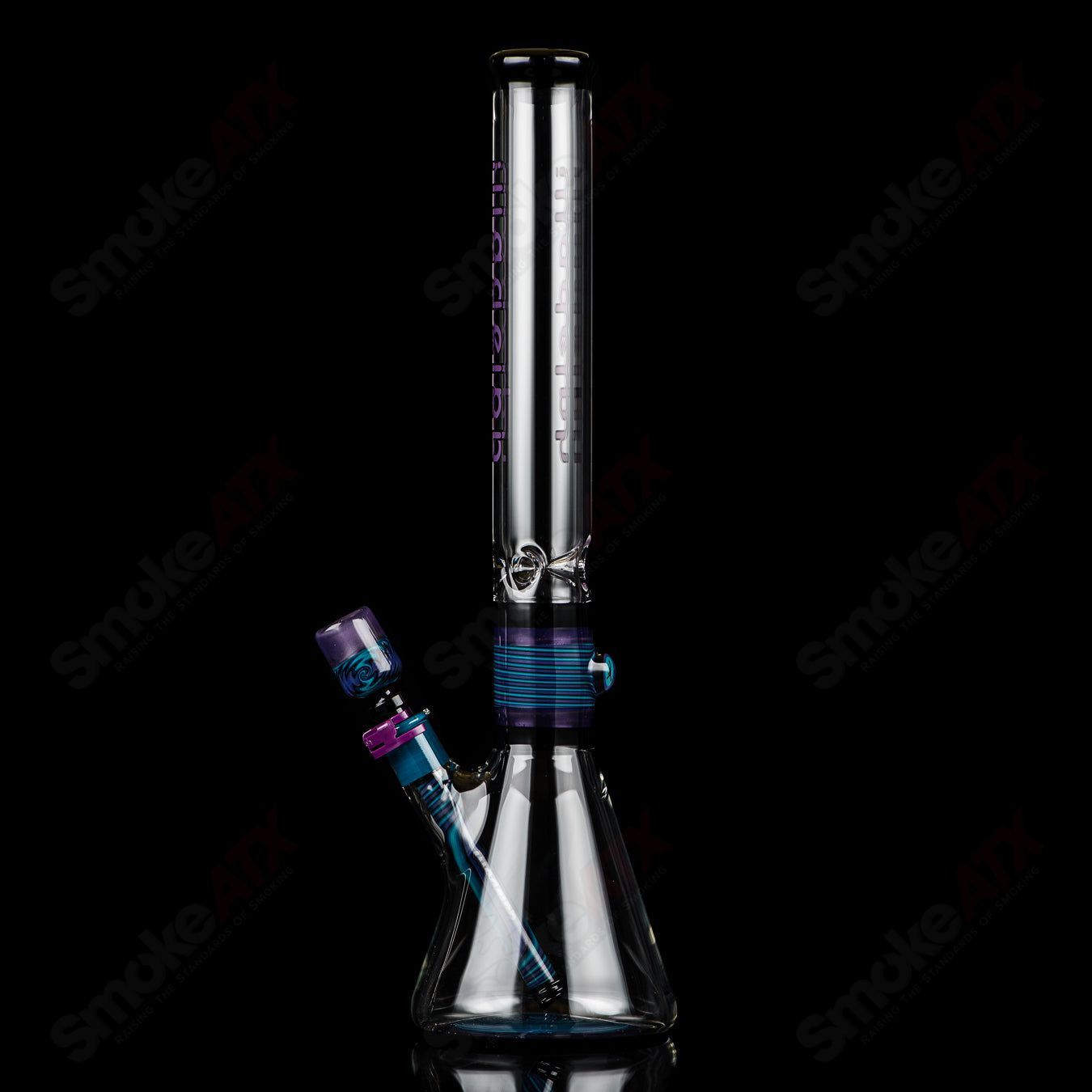 Illadelph Purple and Aqua Jordan Beaker, a colorful heady glass beaker with vibrant purple and aqua accents.