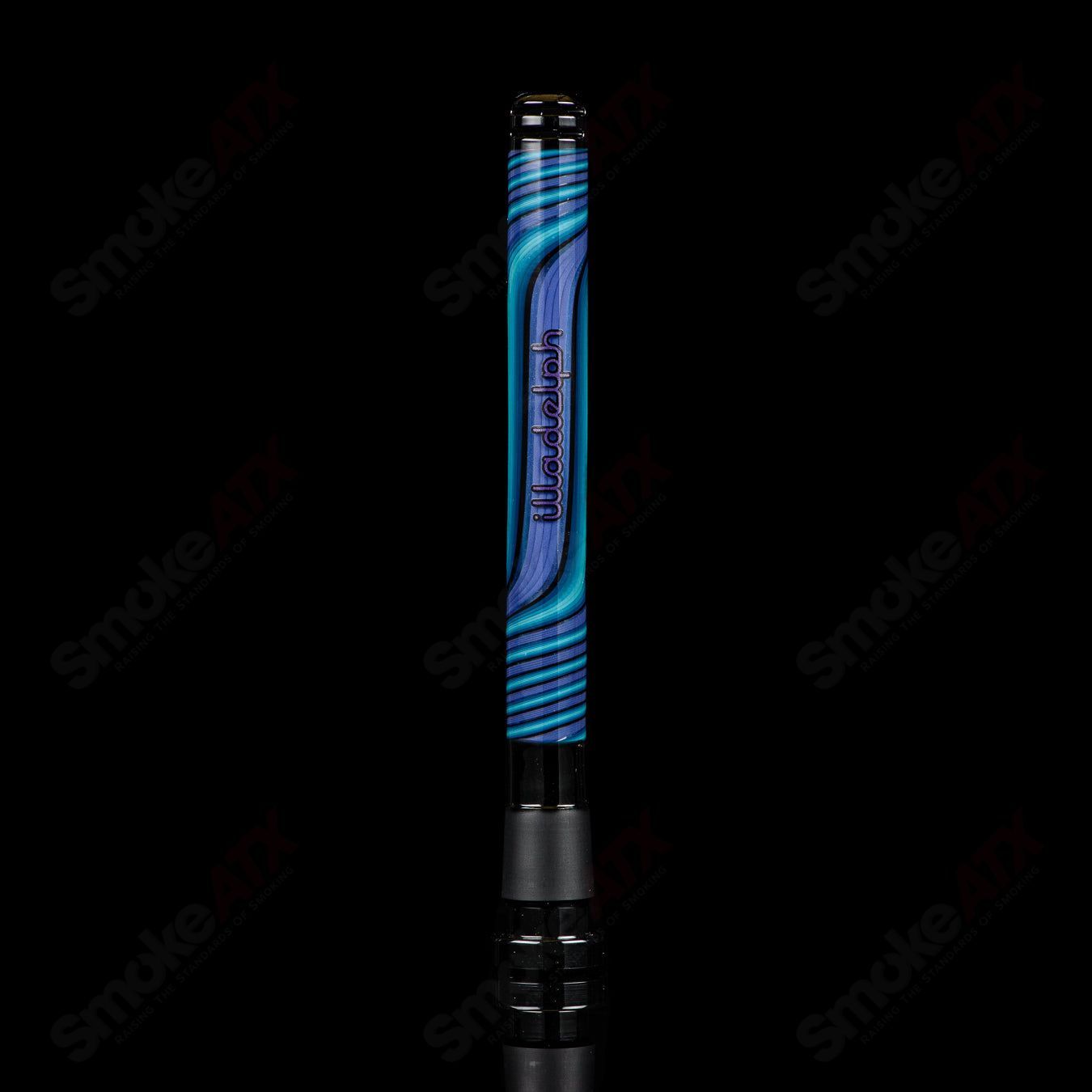 Illadelph Purple and Aqua Jordan Beaker, a colorful heady glass water pipe with vibrant purple and aqua accents.