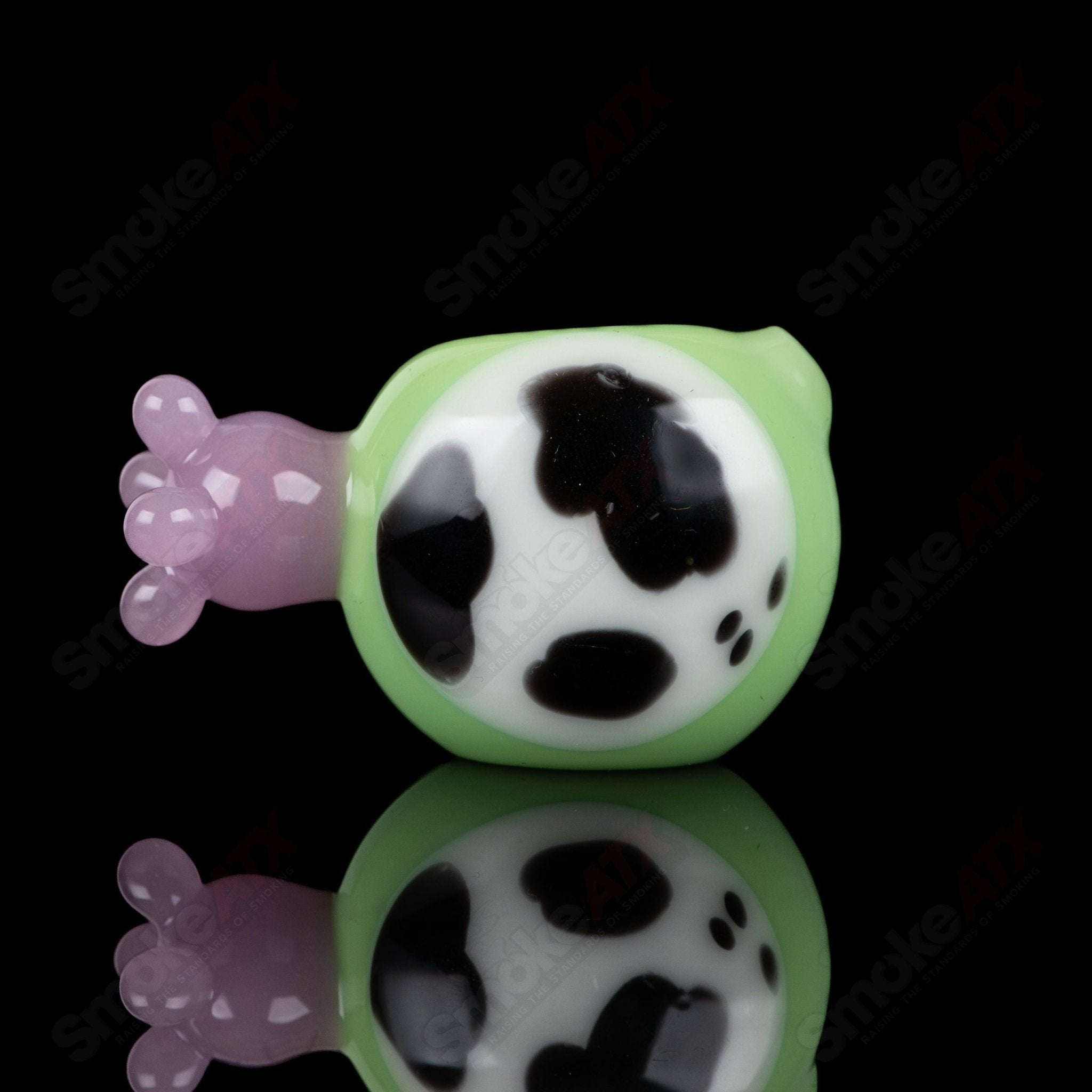 Glass spoon pipe with kiwi cow print design by Adventures In Glass Blowing, featuring vibrant colors and intricate glasswork.