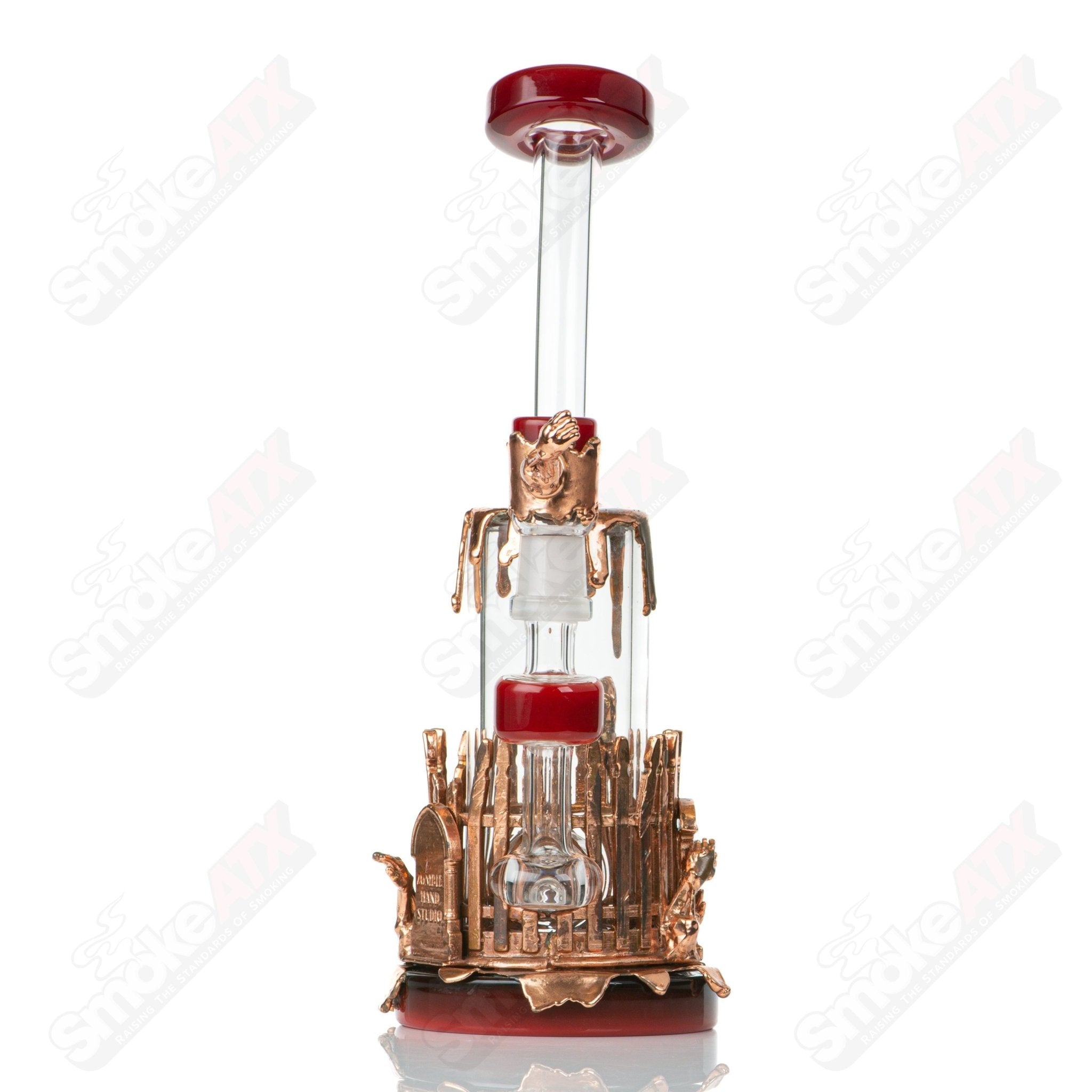 Kuhn Zombiehand Rig, a heady glass concentrate rig with a zombie hand design, featuring intricate glasswork and vibrant colors.