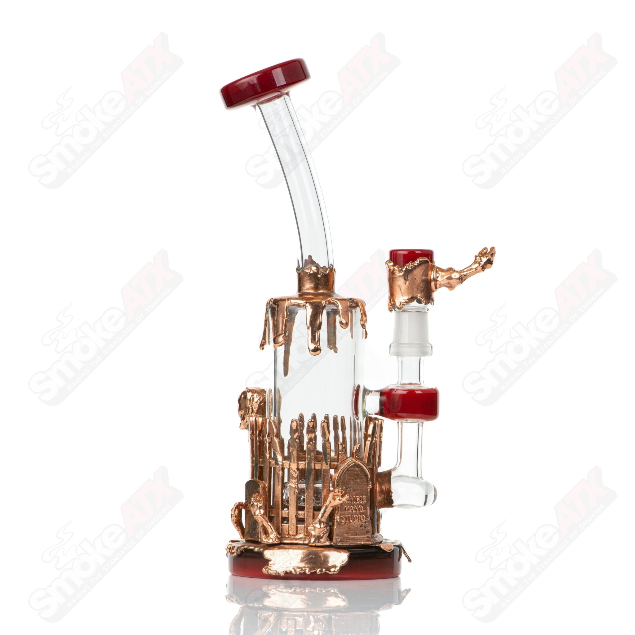 Kuhn Zombiehand Rig, heady glass concentrate rig with a detailed zombie hand design, clear glass with colorful accents.