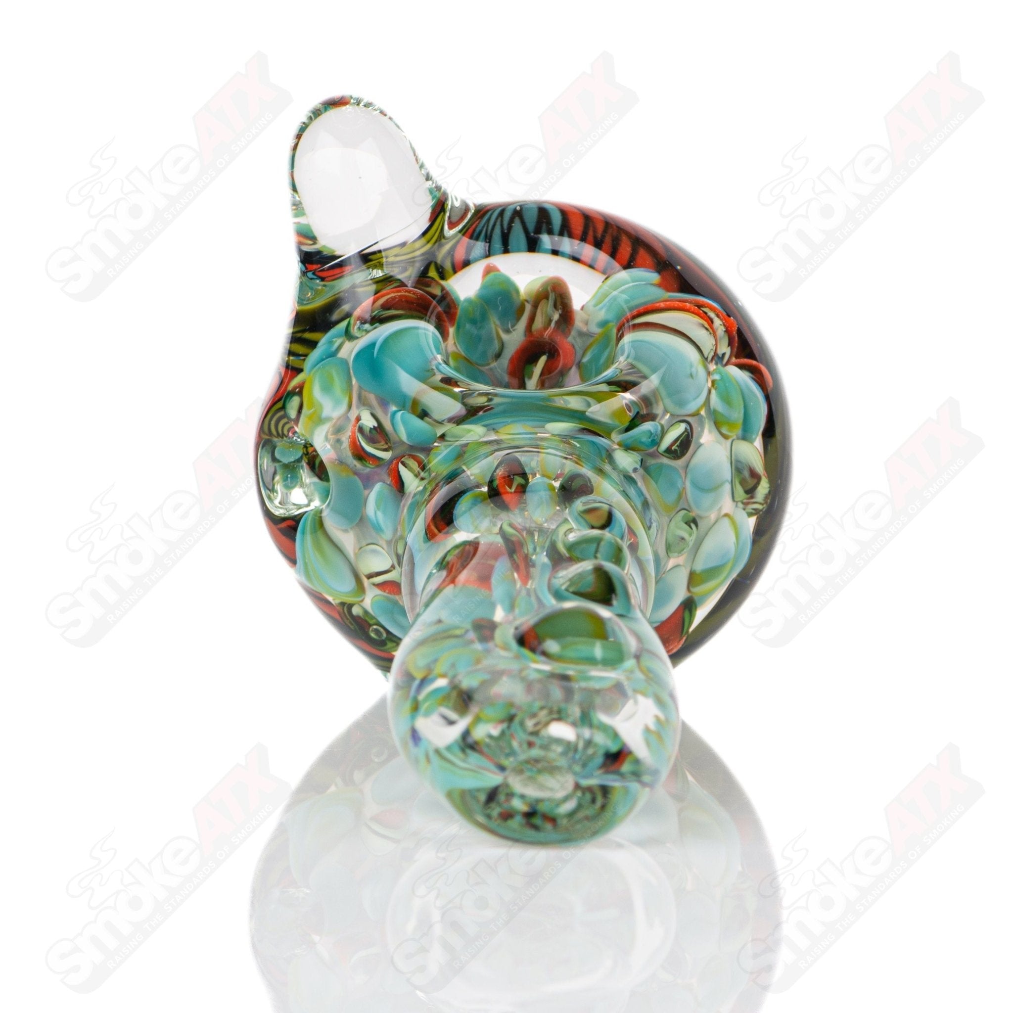 Large Fillacello Spoon glass pipe by Rotational Science with intricate, colorful fillacello design and smooth curvature.