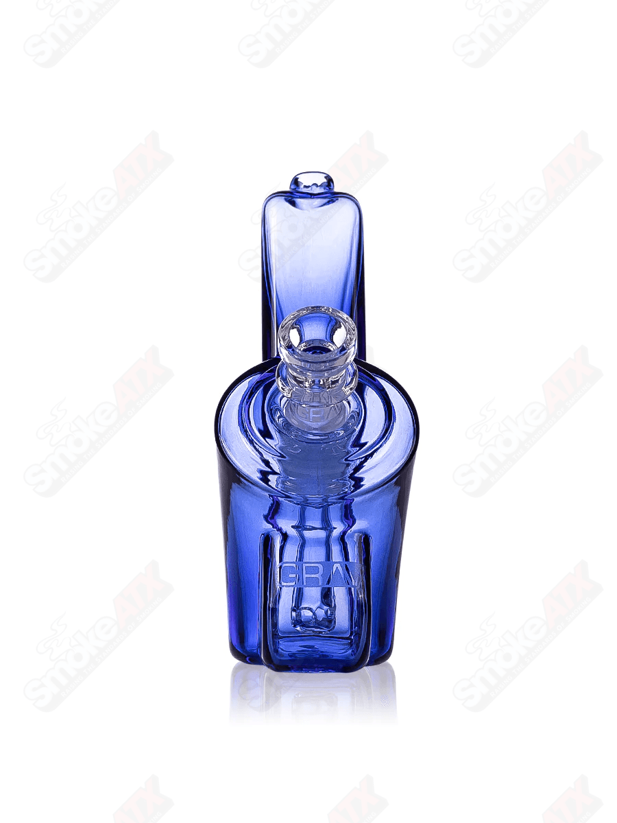 Light cobalt wedge-shaped bubbler waterpipe by Grav Labs with intricate glass design and rounded mouthpiece.