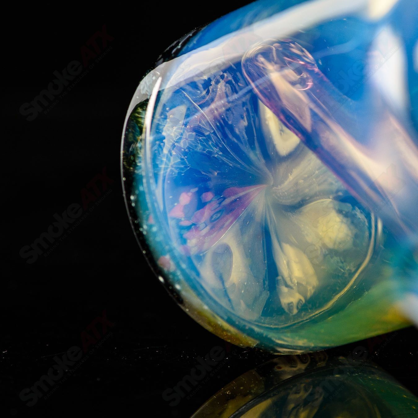Mini Rig #1 by Cap’n Crunk, a heady glass concentrate rig with vibrant design and compact size, perfect for dabbing.