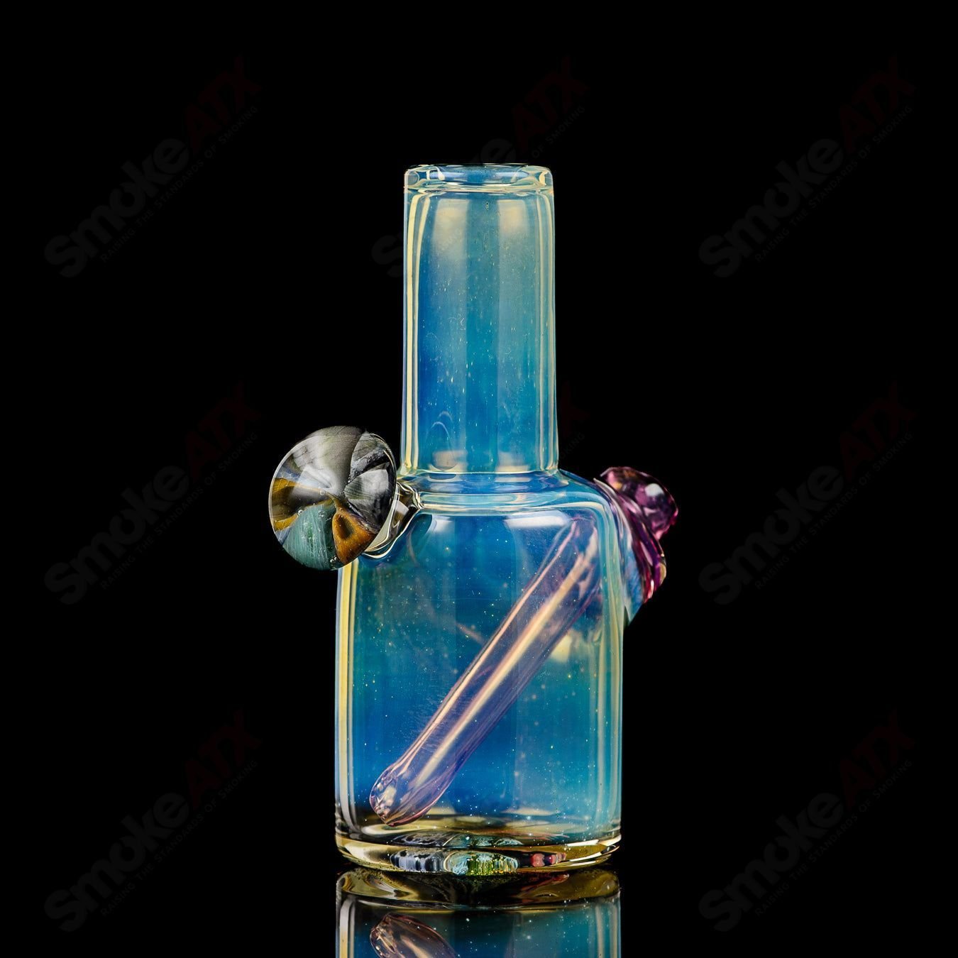 Mini Cap’n Crunk Heady Glass concentrate rig with intricate design and vibrant colors for dabbing and vaping.