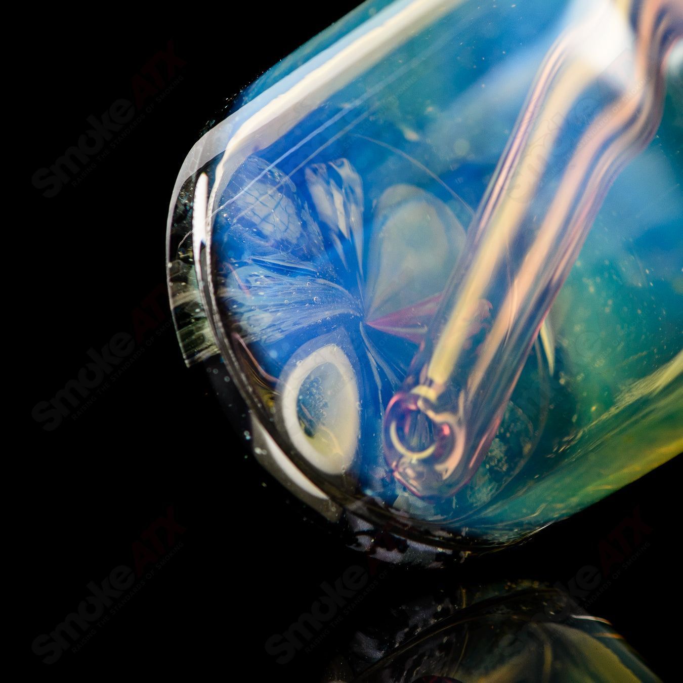 Mini Cap’n Crunk heady glass concentrate rig with intricate design and clear glass body for dabbing and concentrate use.
