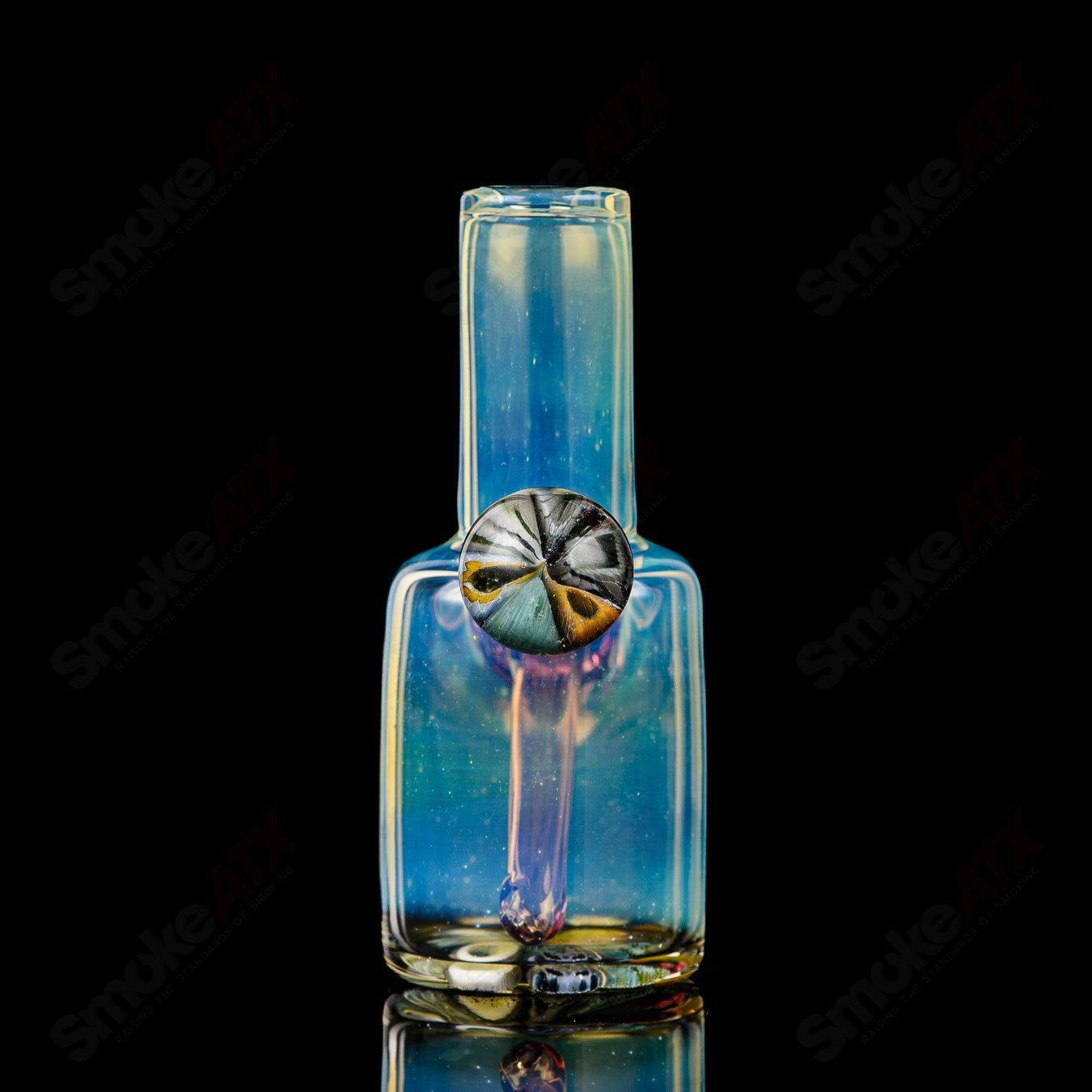 Mini Rig #1 Cap'n Crunk heady glass concentrate rig with vibrant design, compact size, and intricate glasswork.