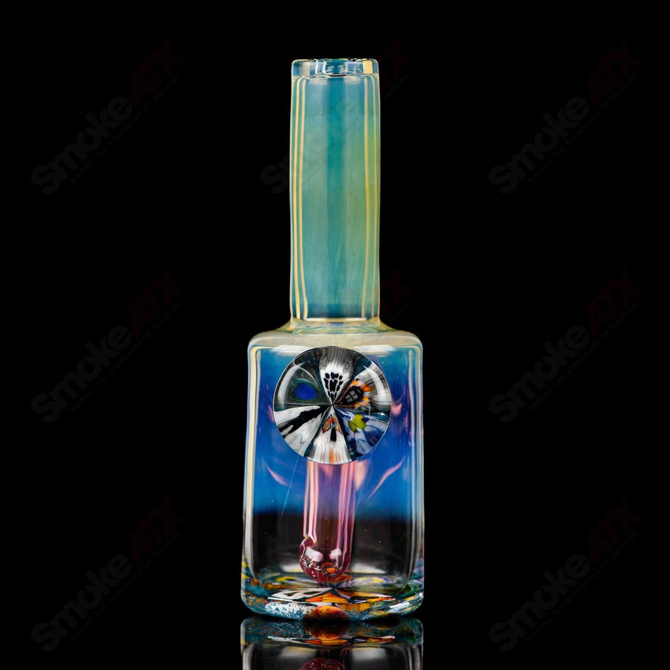Mini Rig #3 Cap'n Crunk heady glass concentrate rig with colorful design and intricate glasswork, perfect for vaporizing concentrates.