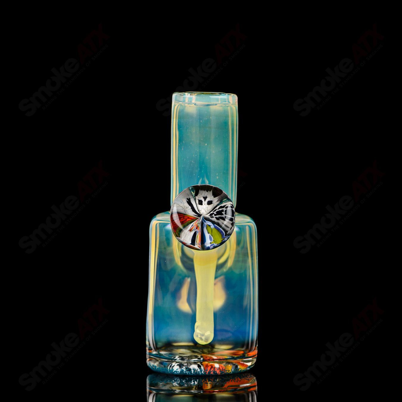 Mini Rig #4 Cap'n Crunk heady glass concentrate rig with vibrant colored accents and intricate design details.