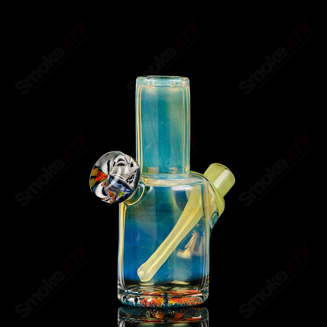 Mini Rig #4 Cap'n Crunk heady glass concentrate rig with colorful, artistic design and compact size for easy use.