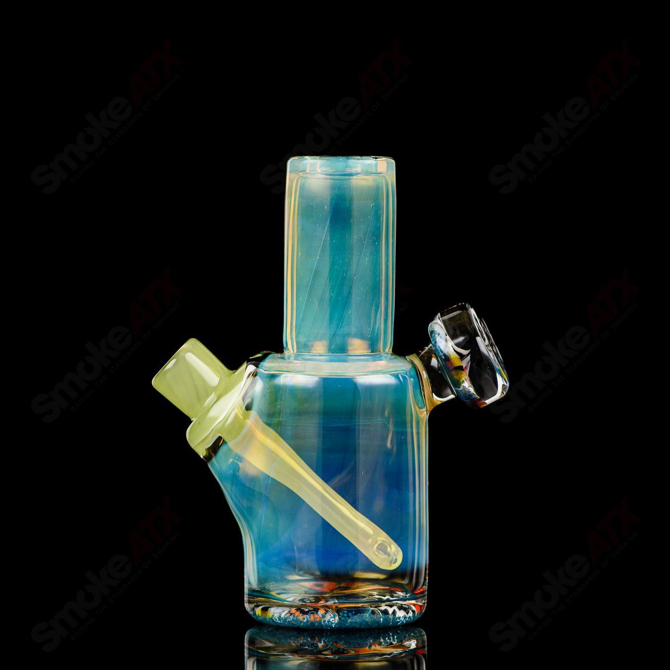 Mini Rig #4 Cap’n Crunk by Cap’n Crunk, a heady glass concentrate rig with colorful glasswork and compact design.