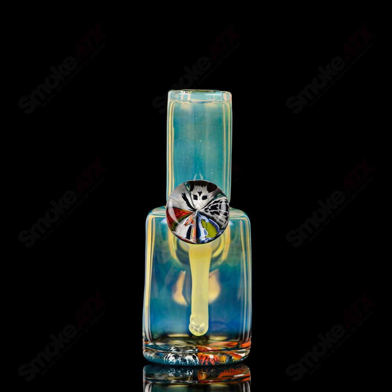 Mini Rig #4 by Cap’n Crunk, a heady glass concentrate rig with intricate design and clear glass construction.