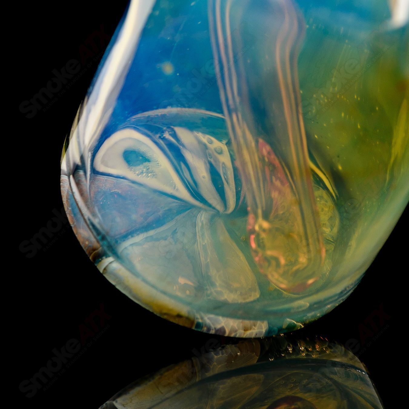 Mini Rig #5 by Cap’n Crunk, a heady glass concentrate rig with intricate design and compact size.