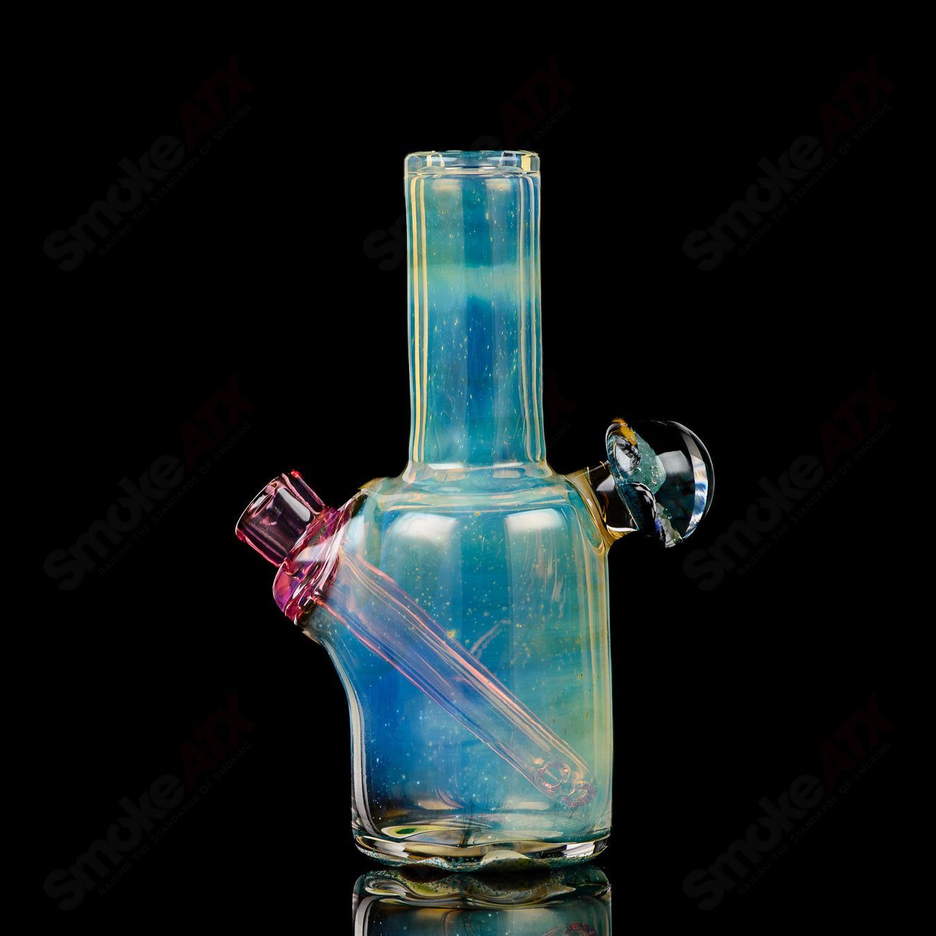 Mini Rig #5 by Cap’n Crunk, a heady glass concentrate rig with colorful design and compact size for easy handling.