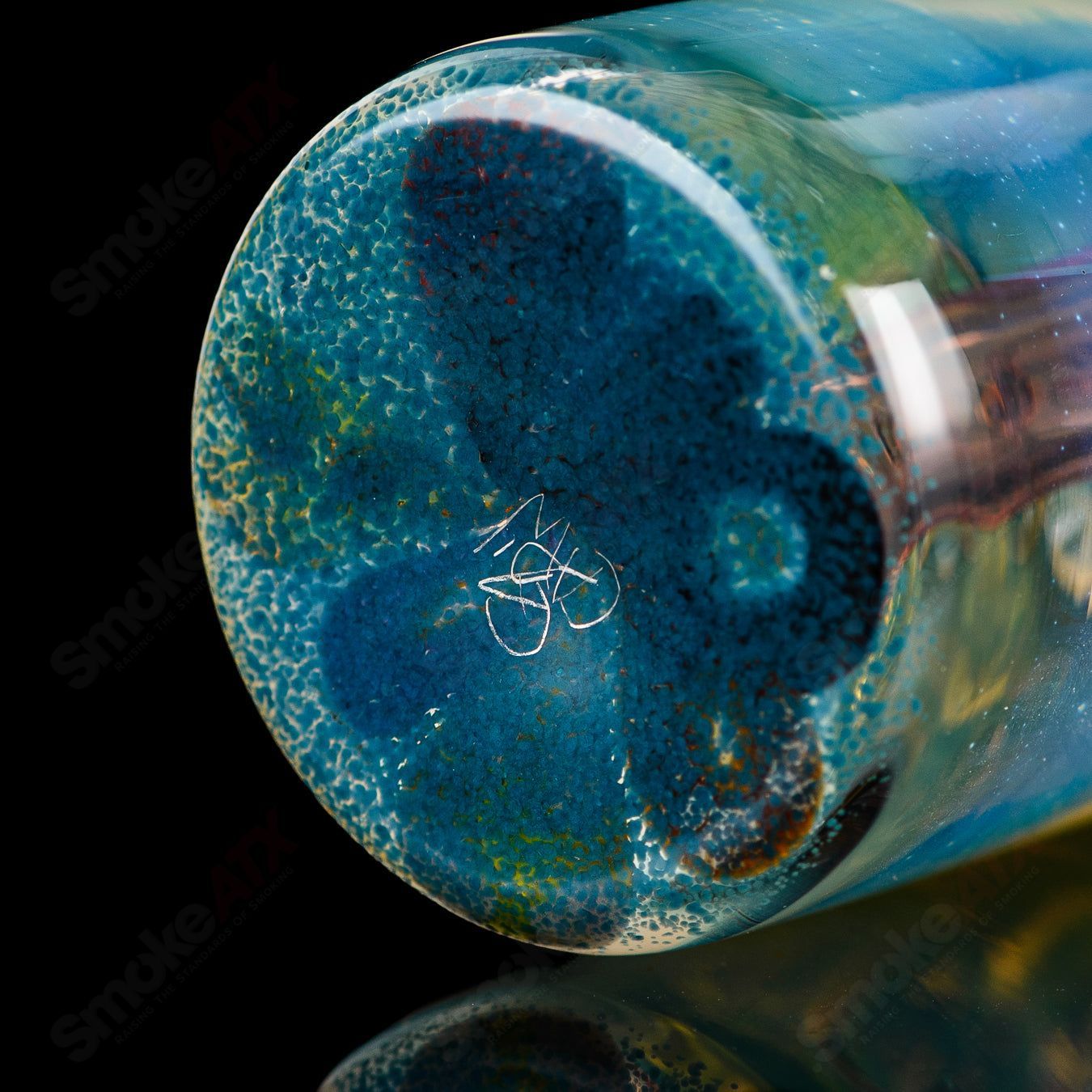 Mini Rig #5 Cap'n Crunk heady glass concentrate rig with intricate designs and a clear, durable glass construction.