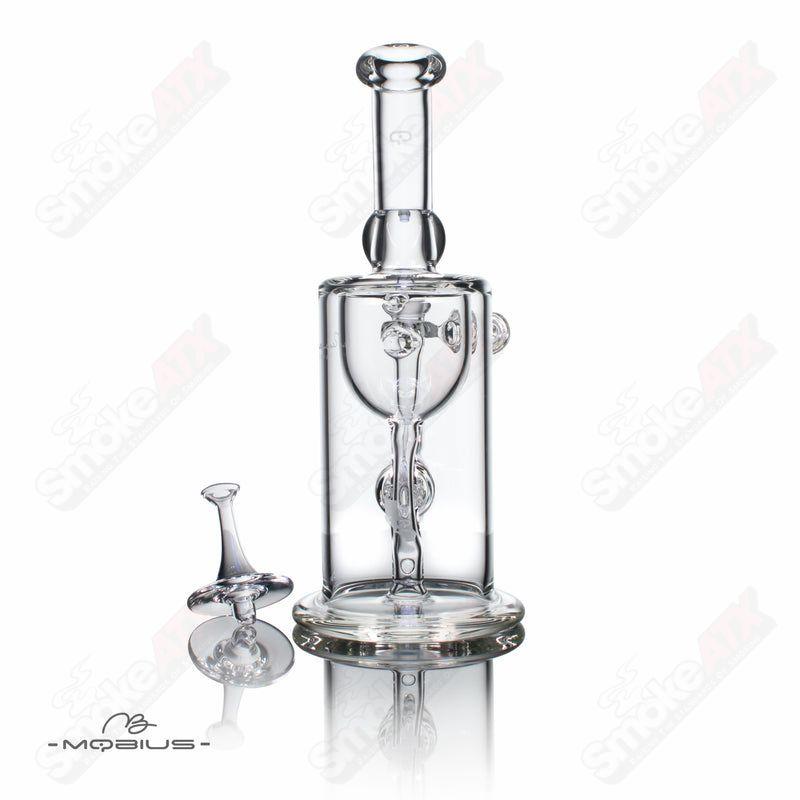 Mobius Recurve Heady Glass incyclers with curved design, clear glass body, and intricate details, showcasing craftsmanship and style.