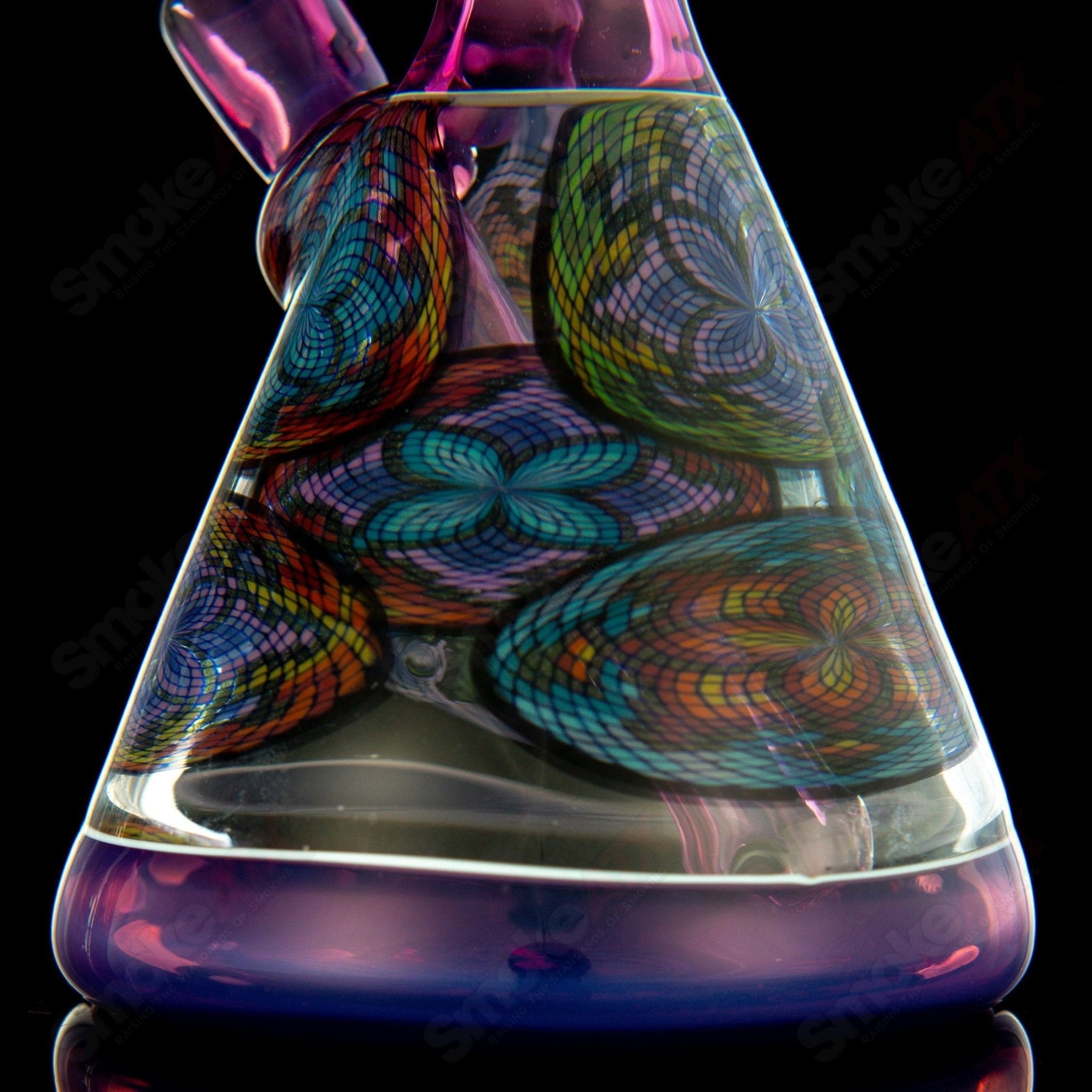 Multiple John W Glass Filla Beakers, colorful heady glass beakers with intricate designs and vibrant glasswork.