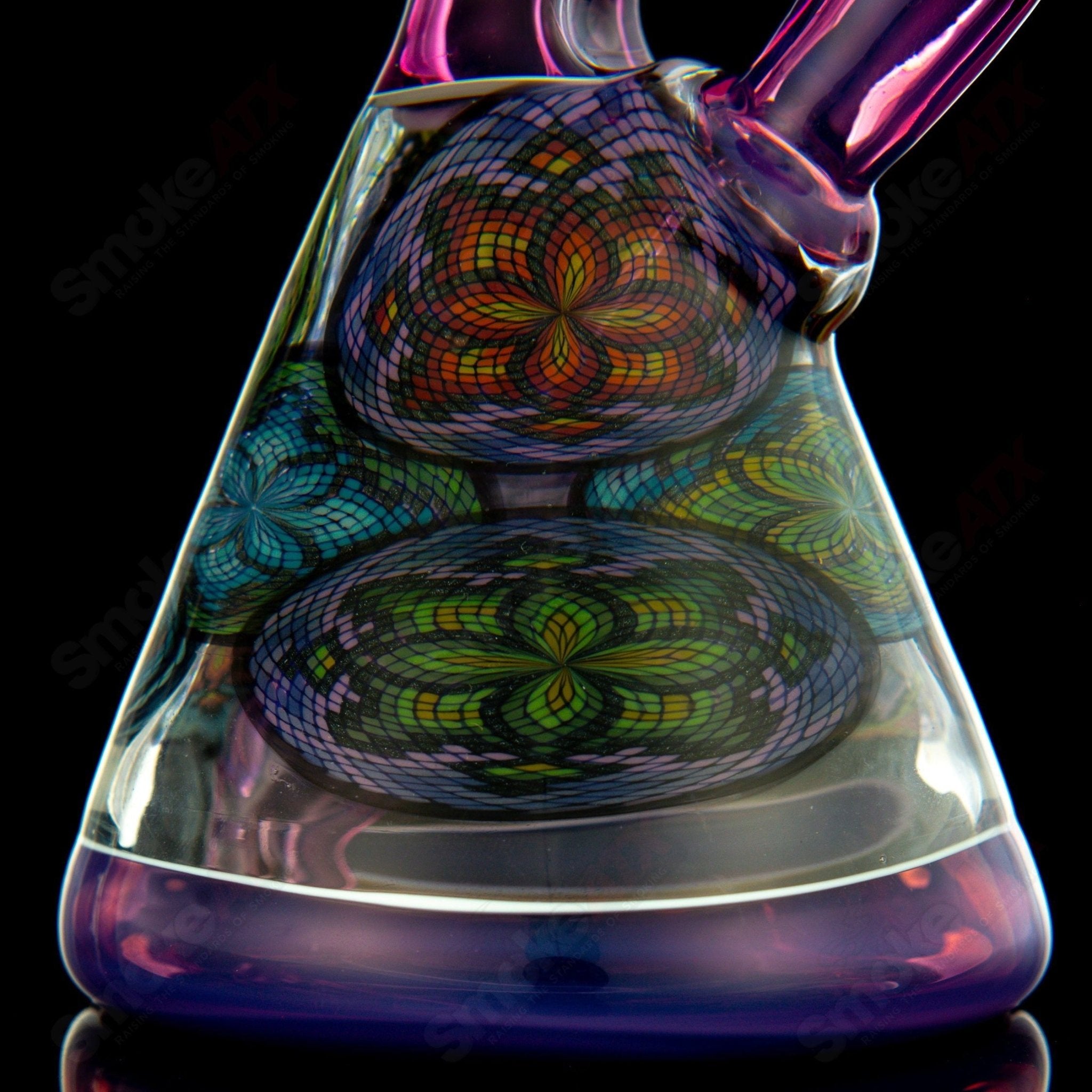 Multiple Filla Beakers by John W Glass, colorful heady glass beakers with intricate designs and vibrant patterns.