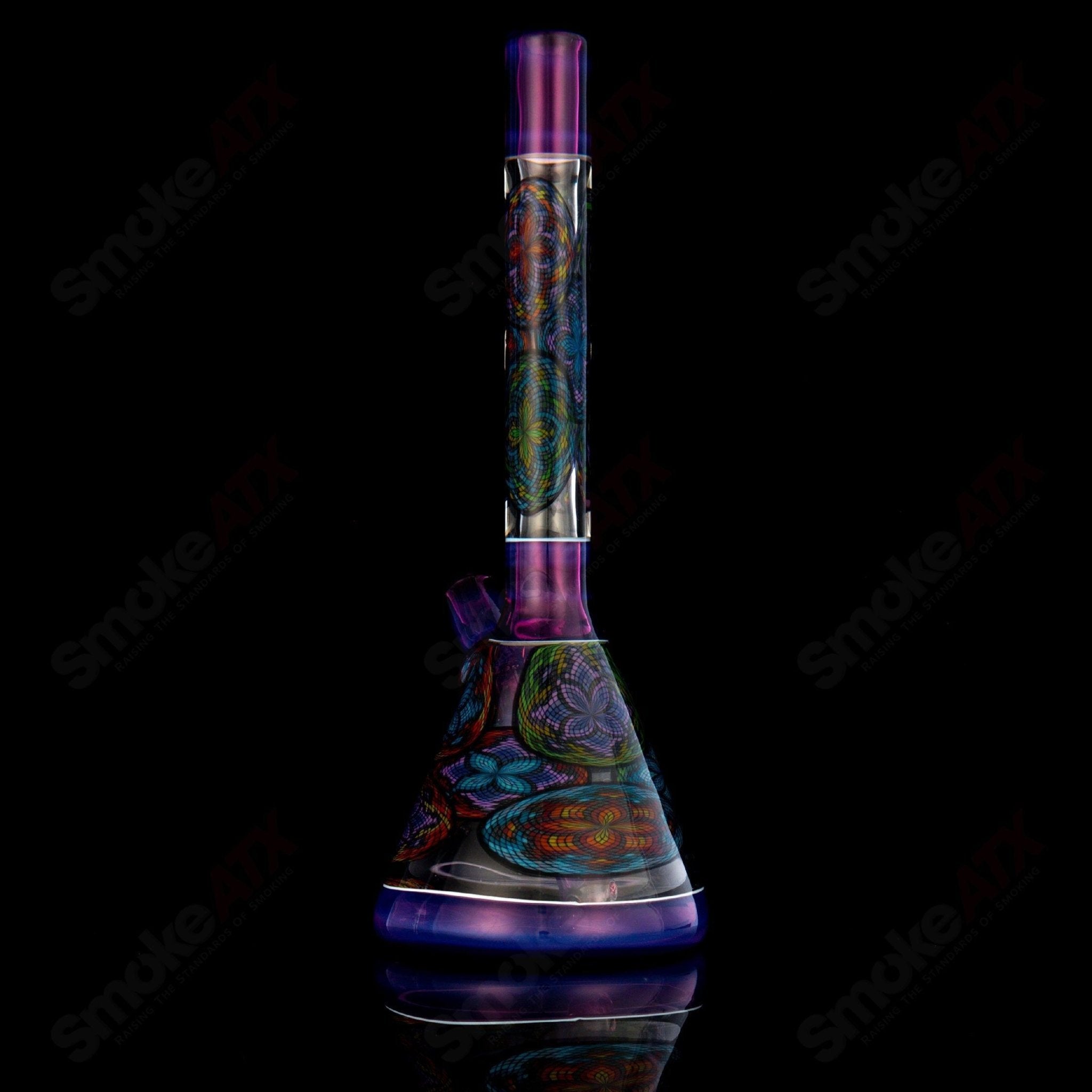 Multiple John W Glass Filla Beakers, colorful heady glass beakers with intricate designs, displayed together.