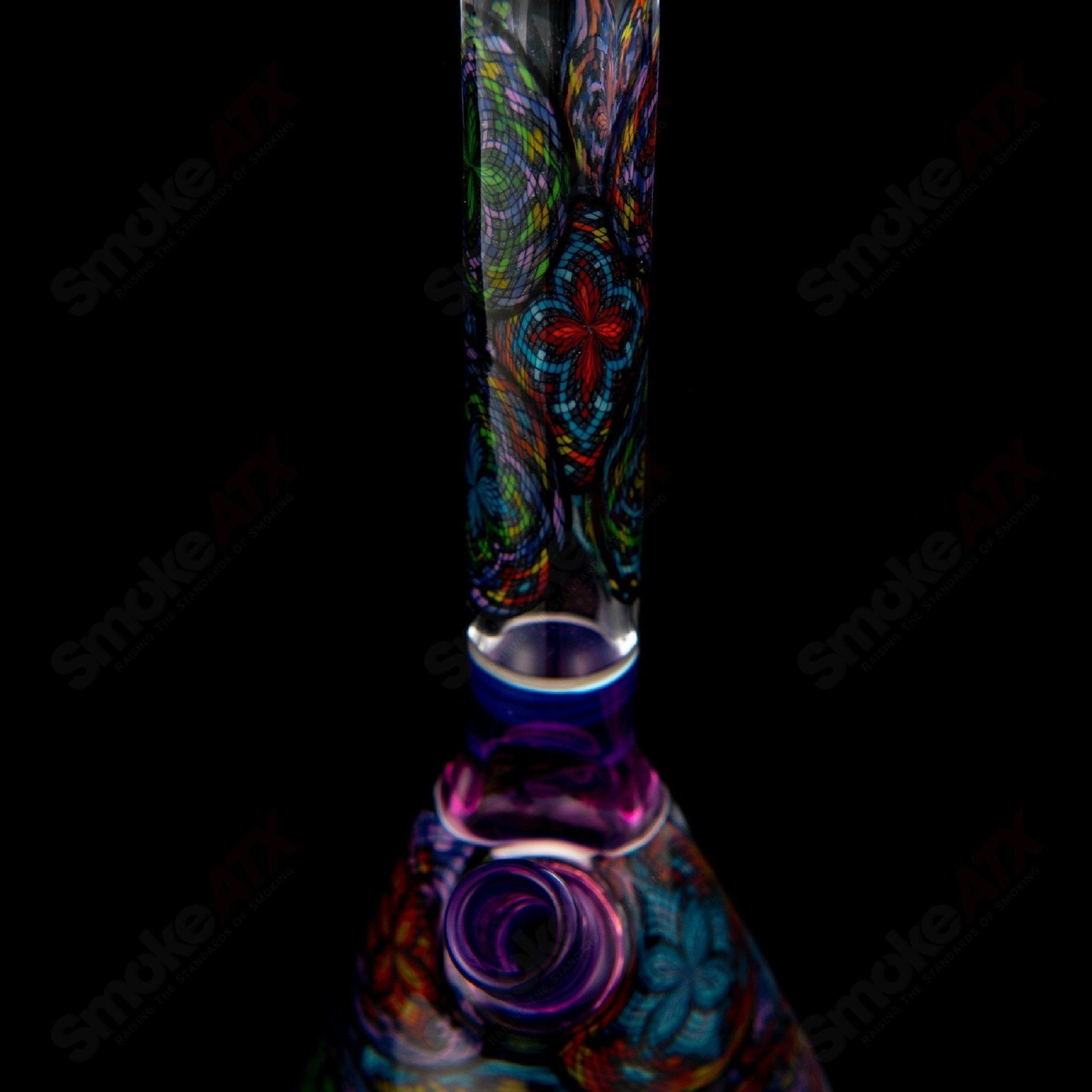 Set of multiple John W Glass Filla Beakers, colorful heady glass beakers with intricate designs and vibrant glasswork.