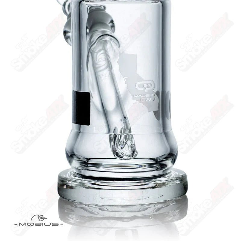 Mobius Nano Reti V2 glass waterpipe with intricate design and clear glass body, showcasing its compact and stylish appearance.