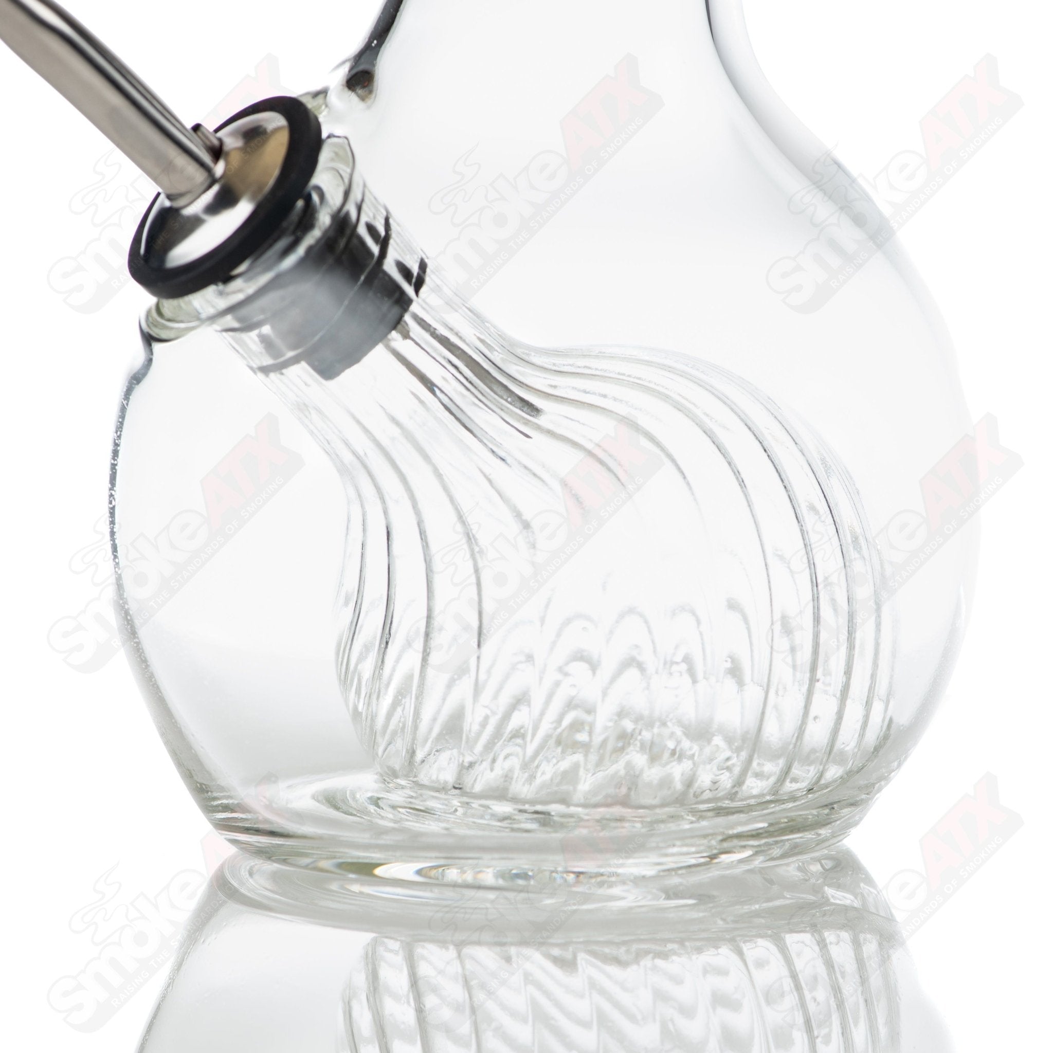 Ribbed glass pour bottle for oil and vinegar by Texas Hot Glass, featuring a clear design and sturdy pour spout.
