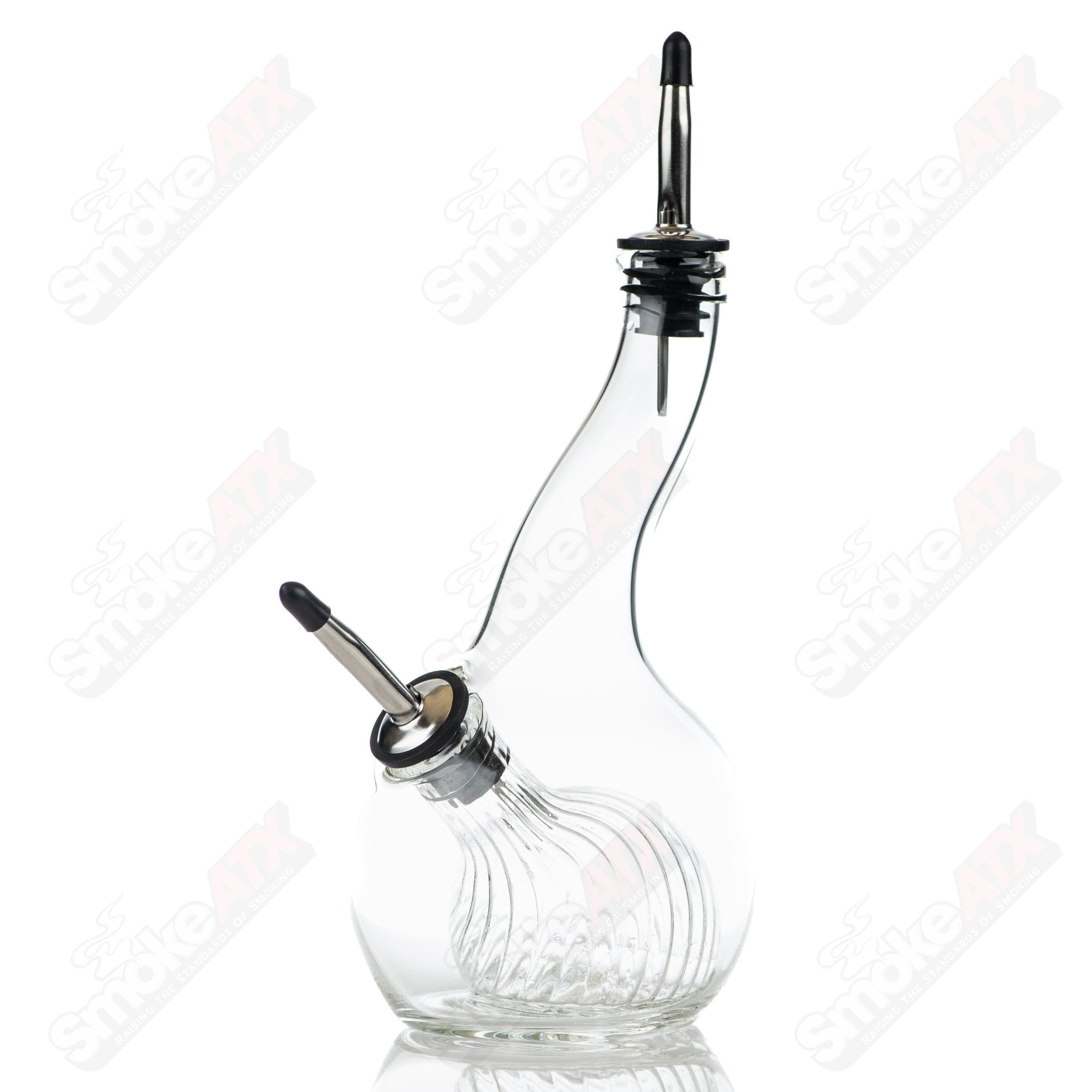 Ribbed glass pour bottle for oil and vinegar by Texas Hot Glass, designed for kitchen use and stylish presentation.