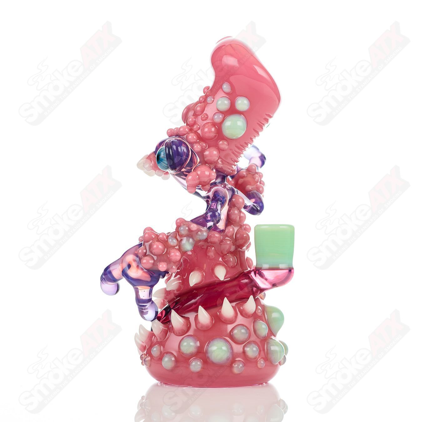 Heady glass concentrate rig named Organism Soul Window by Salt Glass, featuring blush, tooth, stargazer, and slime design elements.